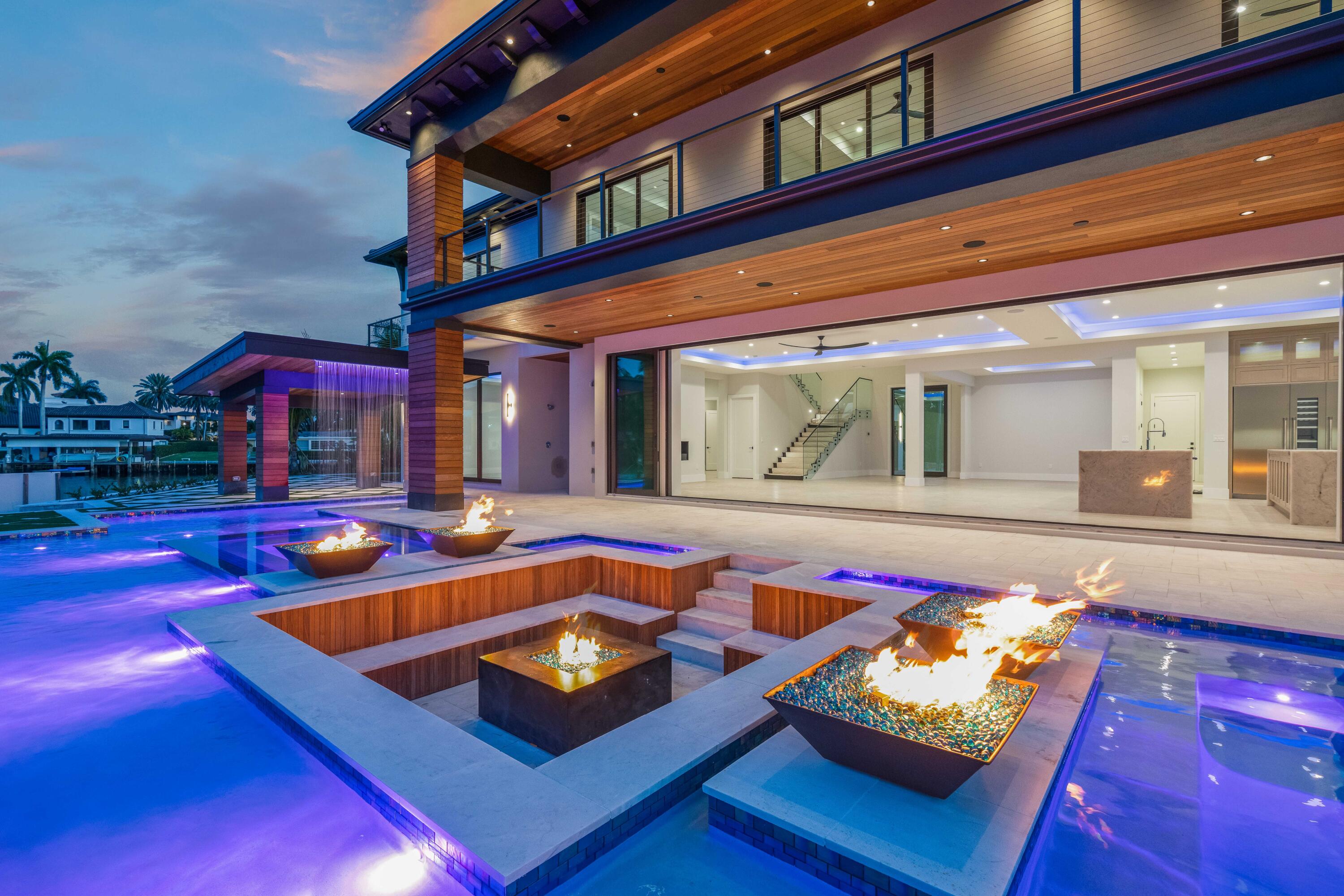 BRAND NEW custom waterfront residence on a deep water canal with turning basin, no fixed bridges and direct ocean access! Bring your large watercrafts and enjoy 188 feet of wide water frontage with new seawall bulkhead and 
 20 new batter piles, 32K lb lift and pristine dock! The epitome of South Florida luxury living with saltwater pool, sun deck, spa, sunken fire pit and poolside cabana with waterfall as well as an oversized covered summer kitchen. Impressive interior with versatile floor plan including 5 bedrooms with 3 primary suites, 7 full baths, 6th/club room and study. Dual garages with ample volume for lifts. Smart home features allow for easy automation of security, sound, pool and more! This cul-de-sac home is a true slice of paradise! Enjoy all the North County waterfront lifestyle has to offer. The Gardens Mall, Downtown at the Gardens, free parking beaches, unbelievable fishing, snorkeling, diving, Stand-Up Paddle-boarding, Spear-Fishing, Kite-Surfing, Cycling, Surfing, Local Restaurants, Shopping, etc.