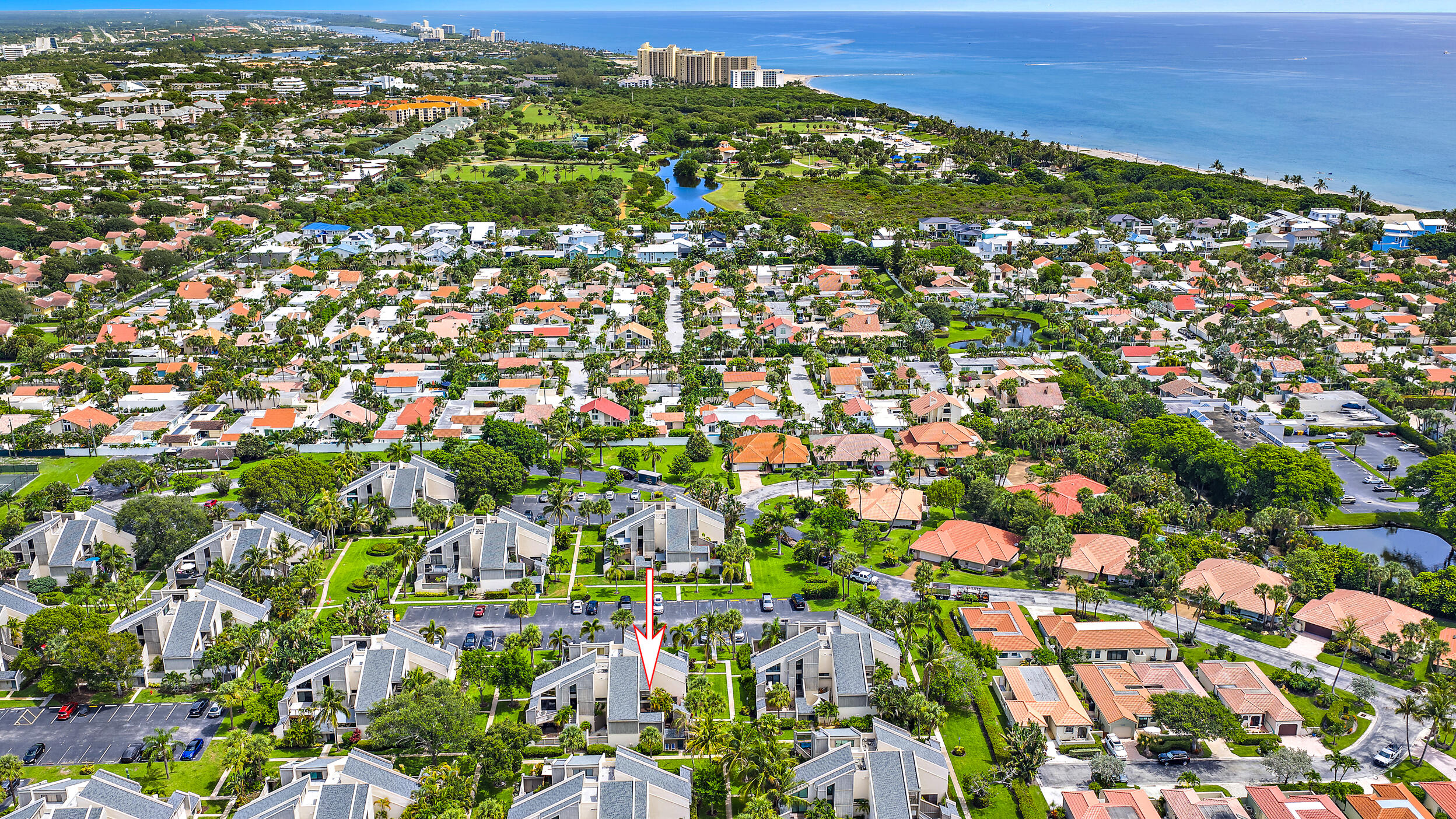 Just a 5-minute walk to Jupiter Beach, this 2-bedroom, 2 bath townhome offers the perfect blend of coastal charm, comfort and investment potential. Rent up to 12 times per year with a 30-day minimum. The home features a private courtyard, ideal for entertaining, grilling, relaxing, or storing beach gear, plus private upper deck that provides additional outdoor retreat.  Located in Jupiter Ocean & Racquet Club, approximately 3/10 of a mile from Jupiter's turquoise beaches and just minutes from Harborside, waterfront dining, shopping and the Maltz Theatre. Enjoy on-site tennis courts. Whether you're a full-time residence, seasonal getaway, or income-producing investment, this home offers exceptional flexibility in one if Jupiter's desirable beachside communities.