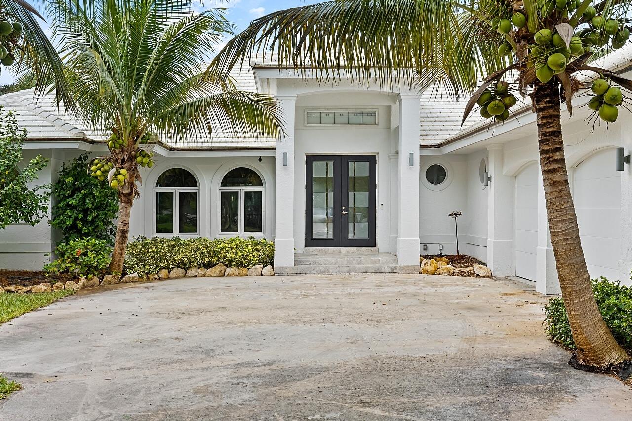 Private & irreplaceable! This property is for those who understand that LOCATION IS EVERYTHING. Sun, Surf, & Seclusion.  One of the few homes directly on the Indian River, no fixed bridges, w/beach access across the street & no HOA for private property freedom.  This 3BR/3.5BA is a retreat like no other.  The kitchen overlooks the wide river, & the large, enclosed porch frames sweeping water views w/breathtaking painted sunset skies. A generous split floor plan provides flexible space for guests, hobbies, or multi-use living. The main bedroom offers two bathrooms, w/one serving as a cabana bath. This private paradise is close to Jensen Beach & Historic Downtown Stuart with charming boutiques, great restaurants, & coastal fun. Click the video in the photos for a 3D tour & floor plan.