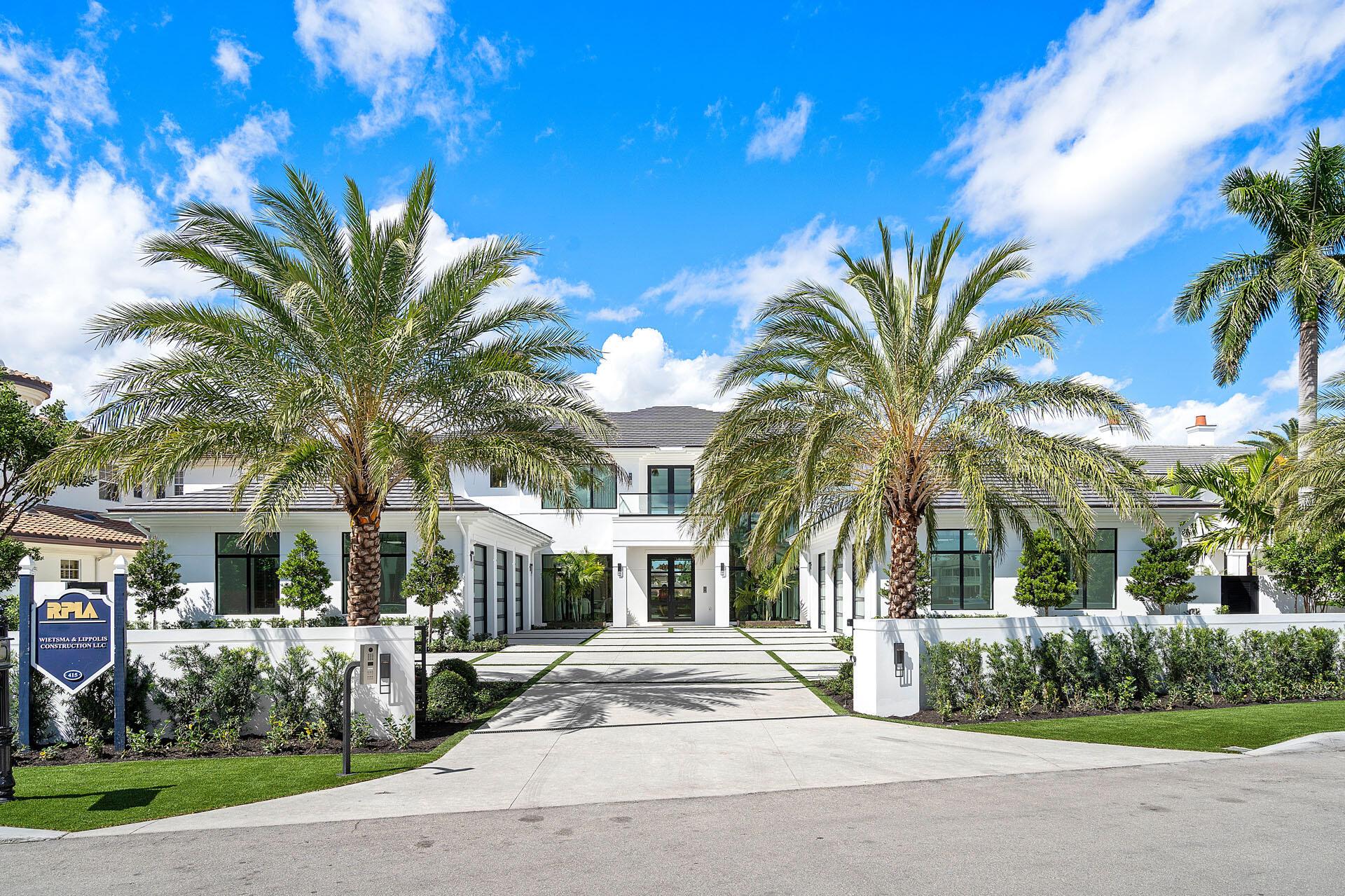 Welcome to a realm of extraordinary refinement in the heart of Royal Palm Yacht & Country Club. This waterfront estate, a testament to Wietsma Lippolis Construction's unparalleled artistry, offers over a 1/2 acre of premier living on the Buccaneer Palm Waterway, merging indulgence with tranquility.

Beyond the grandeur of the gated motor court, where two reflecting pools mirror the South Florida sky, this 10,784-square-foot turn-key residence unveils a mosaic of six-bedroom suites and vast living spaces perfectly curated by Artisan Interiors. The gourmet open-air kitchen is a haven for culinary enthusiasts, while a stately study and a stylish club room with a designer bar and 900-bottle wine room cater to your diverse entertainment needs. Crestron's innovative home technology seamlessly controls every comfort and amenity of this modern marvel.

Outside, a series of meticulously designed entertaining spaces await. The knife-edge pool with astonishing acrylic infinity edge and waterside firepit lounge will delight year round. Whether under the motorized pergola, amidst the equipped summer kitchen, or arriving at your private deep-water dock, each area is an invitation to indulge in the delights of waterfront living. Here, the boundaries between everyday life and vacation blur, offering an escape into a world where luxury knows no bounds.
