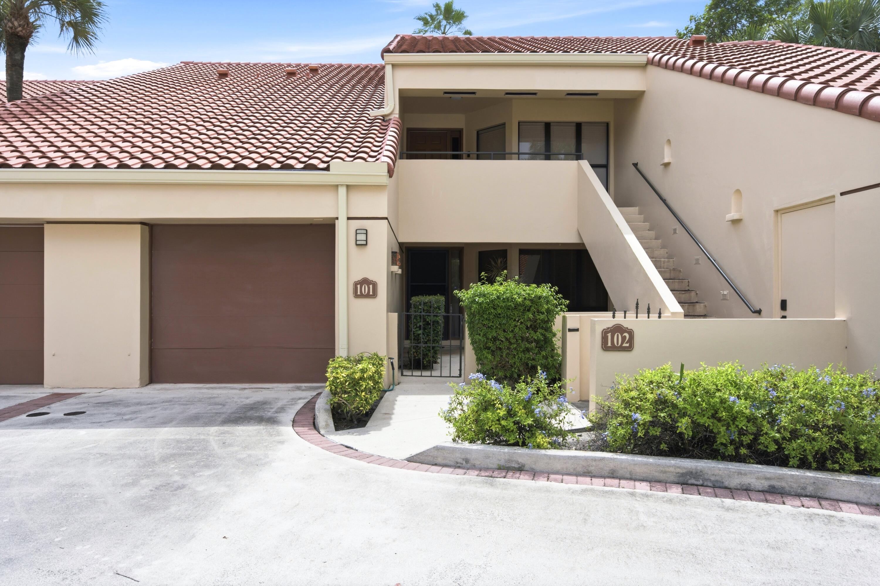 Excellent location in PGA National and freshly updated!  This 2 bedroom 2 bathroom condo sits in a beautiful private residential community with only 16 condos nestled in a single family community.  The first floor unit has a gated courtyard entry.  The unit has been freshly updated with new Luxury Vinyl Plank wood look flooring, fresh paint, new ceiling fans, appliances, and crown molding.  This end unit offers plenty of natural lighting compared to the interior units.  The unit offers a nice sized living room, separate dining area, primary bedroom and bathoom, large guest room, and full second bathroom.  The primary bedroom has a very large walk-in closet, and nicely renovated primary bathroom with separate shower and tub, plus dual sinks.    The second bedroom has a large wall length closet.  The second full bathroom has recent renovation as well with new vanity and counter, and also serves as the guest bathroom.  This unit also has a beautiful private screened in patio for your morning coffee or evening relaxation.  Unlike most rentals in the area, this unit has its own private attached 1 car garage, plus an additional assigned parking space. with plenty of additional overhead storage in a loft space of the garage.  The apartment has an in unit laundry room with full size washer and dryer plus storage cabinetry. PGA National is beautiful, desirable, safe community offering full amenities with manned guard gate to the community.  This community is also a top rated school district.  You will enjoy easy access to the Florida Turnpike, I-95, and enjoy everything Palm Beach Gardens has to offer with dining, entertainment, sporting events, etc.