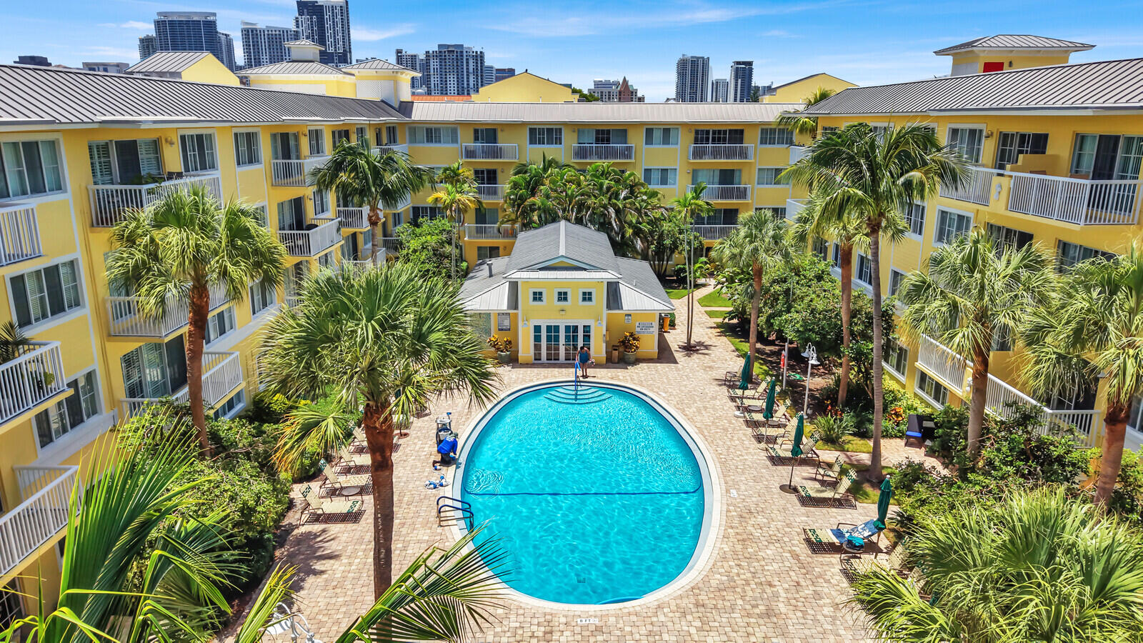 Welcome to this bright and inviting top-floor corner unit in Pine Crest Village! This 2 bedroom, 1 bathroom condo features an open-concept layout with a dedicated dining area that flows seamlessly into the spacious living room.  The kitchen is equipped with granite countertops, wood cabinetry and stainless steel appliances. Added convenience of in-unit laundry. Tile flooring runs throughout the home for a clean, cohesive look. Step outside to your private balcony overlooking the community pool, offering a relaxing spot to enjoy your morning coffee or unwind at the end of the day.  Pine Crest Village offers residents access to a community pool, fitness center, and is pet-friendly. Ideally located just blocks from the vibrant Las Olas Boulevard, you'll be close to the heart of downtown Fort Lauderdale - known for its exceptional restaurants, lively nightlife, boutique shopping, and year-round events. Close to major highways and a short drive to the airport. Enjoy the community's proximity to Fort Lauderdale's beautiful beaches and to all that South Florida has to offer!