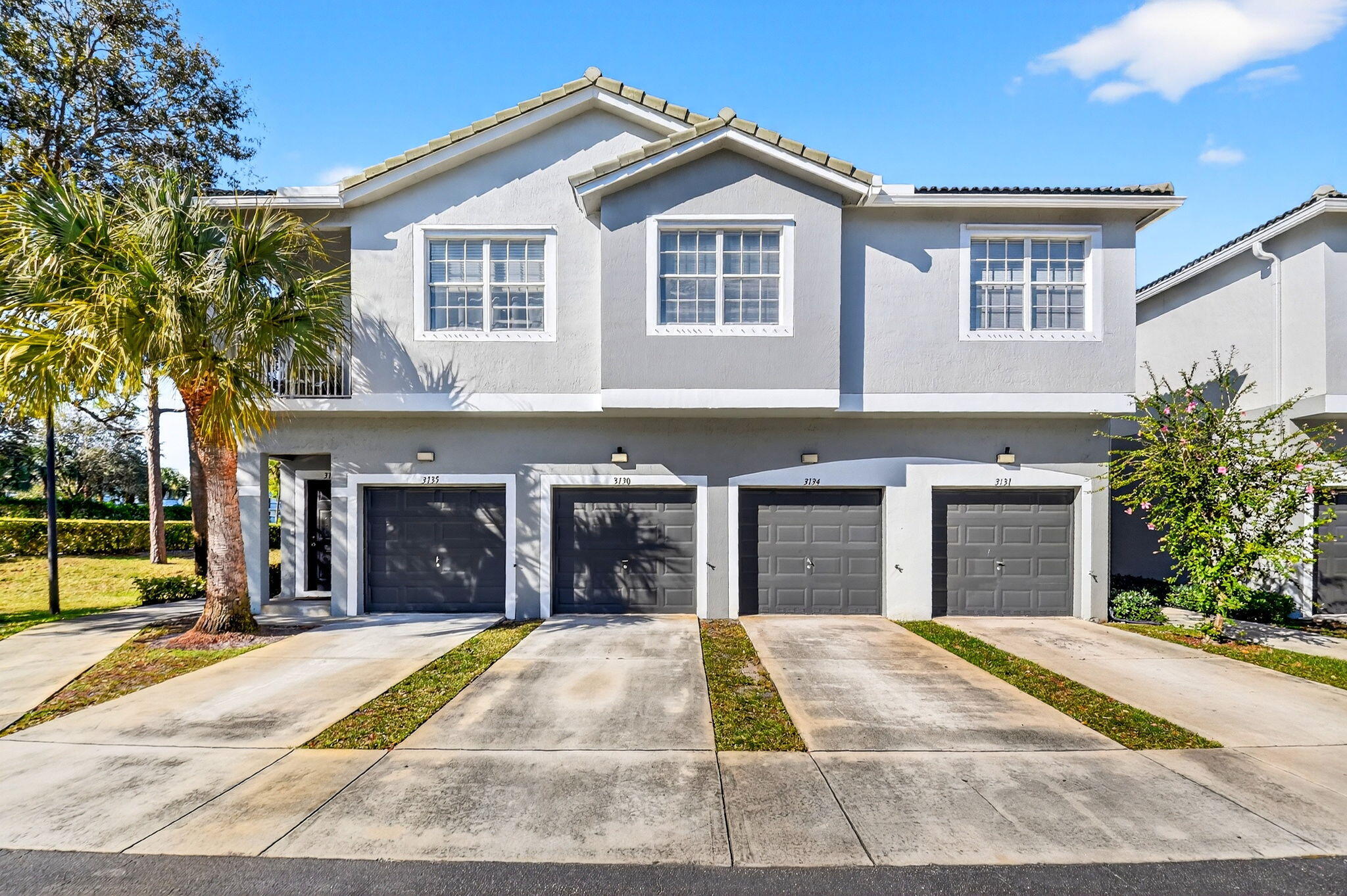 Beautiful 3-Bedroom Condo with Garage
Light and bright corner unit located in a gated community. This 3-bedroom, 2-bath condo features a private first-floor entry with a small foyer and an attached 1‑car garage. All living areas are on the second floor, offering laminate flooring throughout and tile in the kitchen and bathrooms.
The open balcony overlooks a peaceful garden view. The kitchen includes 42'' cabinets and stainless steel appliances. Community amenities include a pool.