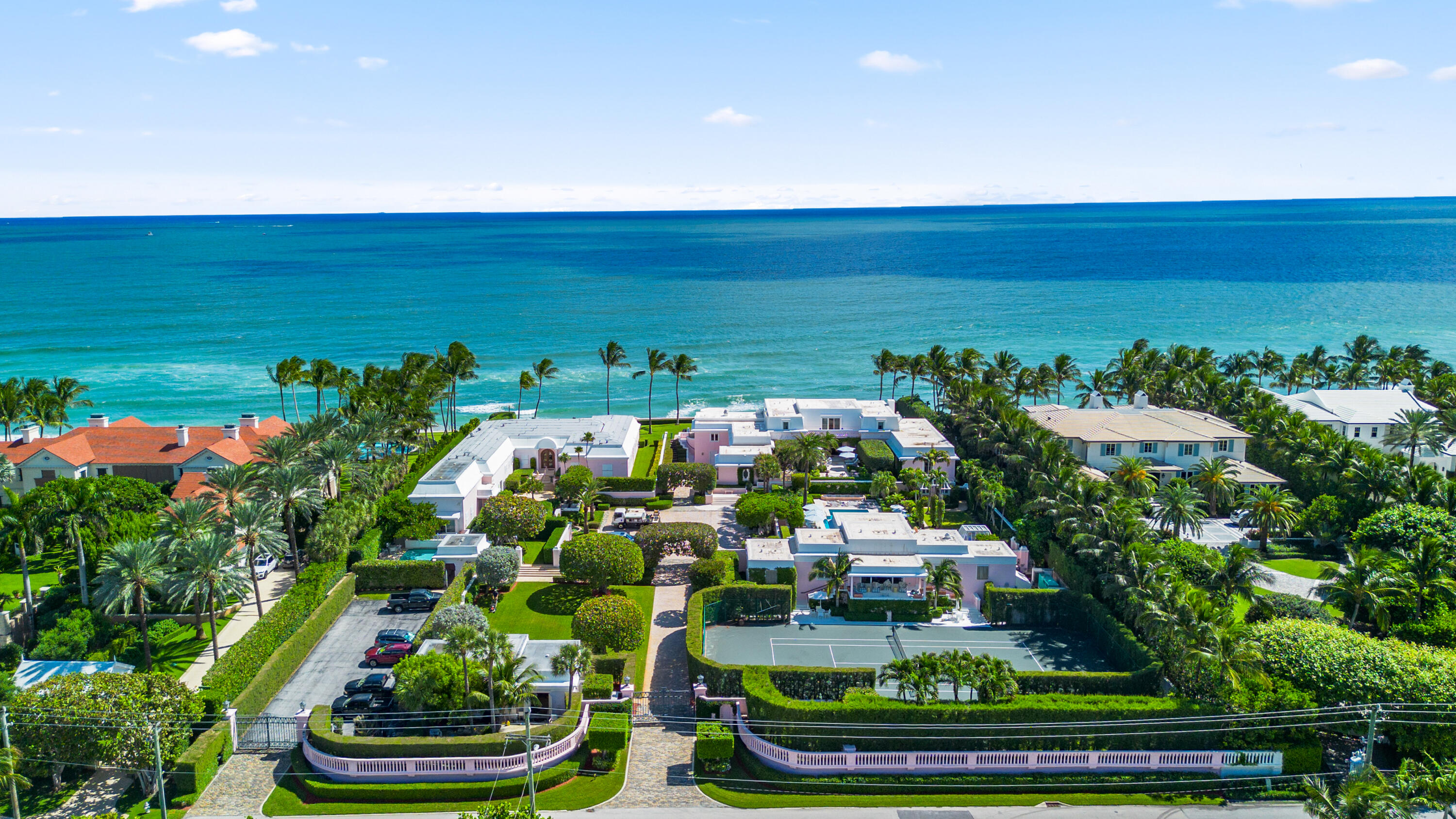 A once-in-a-generation opportunity to own one of Palm Beach's most significant oceanfront estates. Set on approximately 2.25 acres with over 250 feet of direct ocean frontage, this rare compound offers commanding views of the Atlantic and an exceptional sense of privacy. The residence and guesthouse are surrounded by formal gardens, a tennis court, and a resort-style pool—blending timeless Palm Beach elements with exceptional scale and potential. Whether enjoyed as is or reimagined into a bespoke new legacy estate, opportunities of this caliber are exceedingly rare.