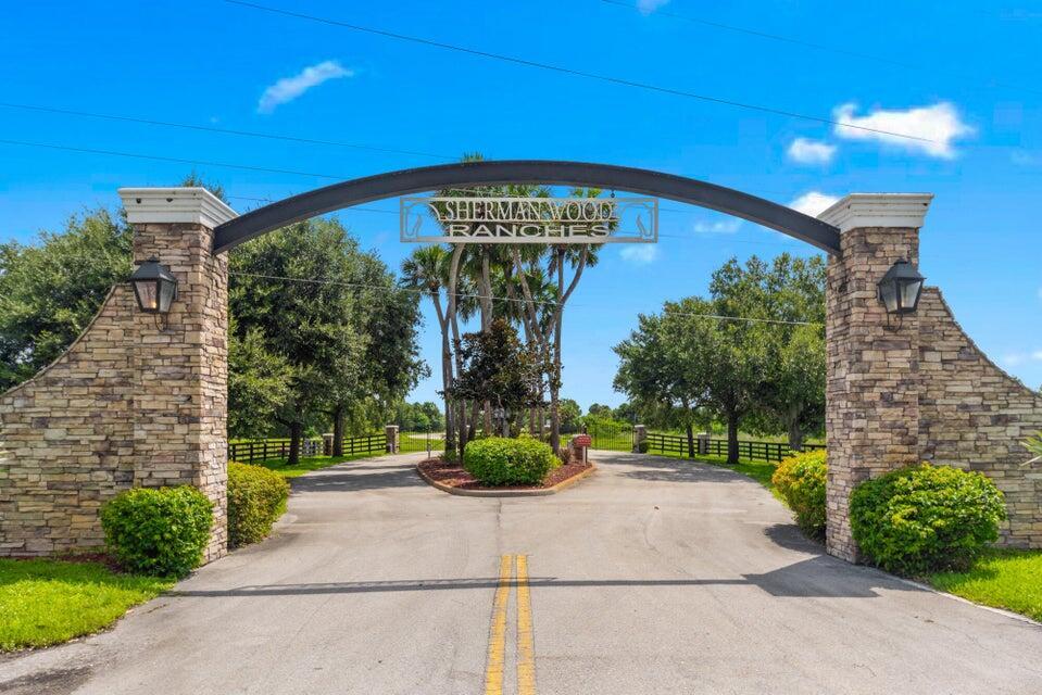 This beautiful & tranquil 10.67 acre lot is located in a beautiful rural gated community called Sherman Wood Ranches. Requirements for building a Single-family home is a minimum of 2,000 sq ft under air, an option to have a guest house/ in law suite up to 50% of the primary house. Build a barn, store a boat and or RV, have horses or cattle and so much more. This quiet deeded community has designated 5 miles of horse trails, paved roads, underground utilities and is located within 10 minutes from downtown Okeechobee, close to Lake Okeechobee fishing, 30 min from I-95 & the Florida Turnpike, Minutes from the County Agri Civic center and Fair grounds. Come see this tranquil hidden gem!
