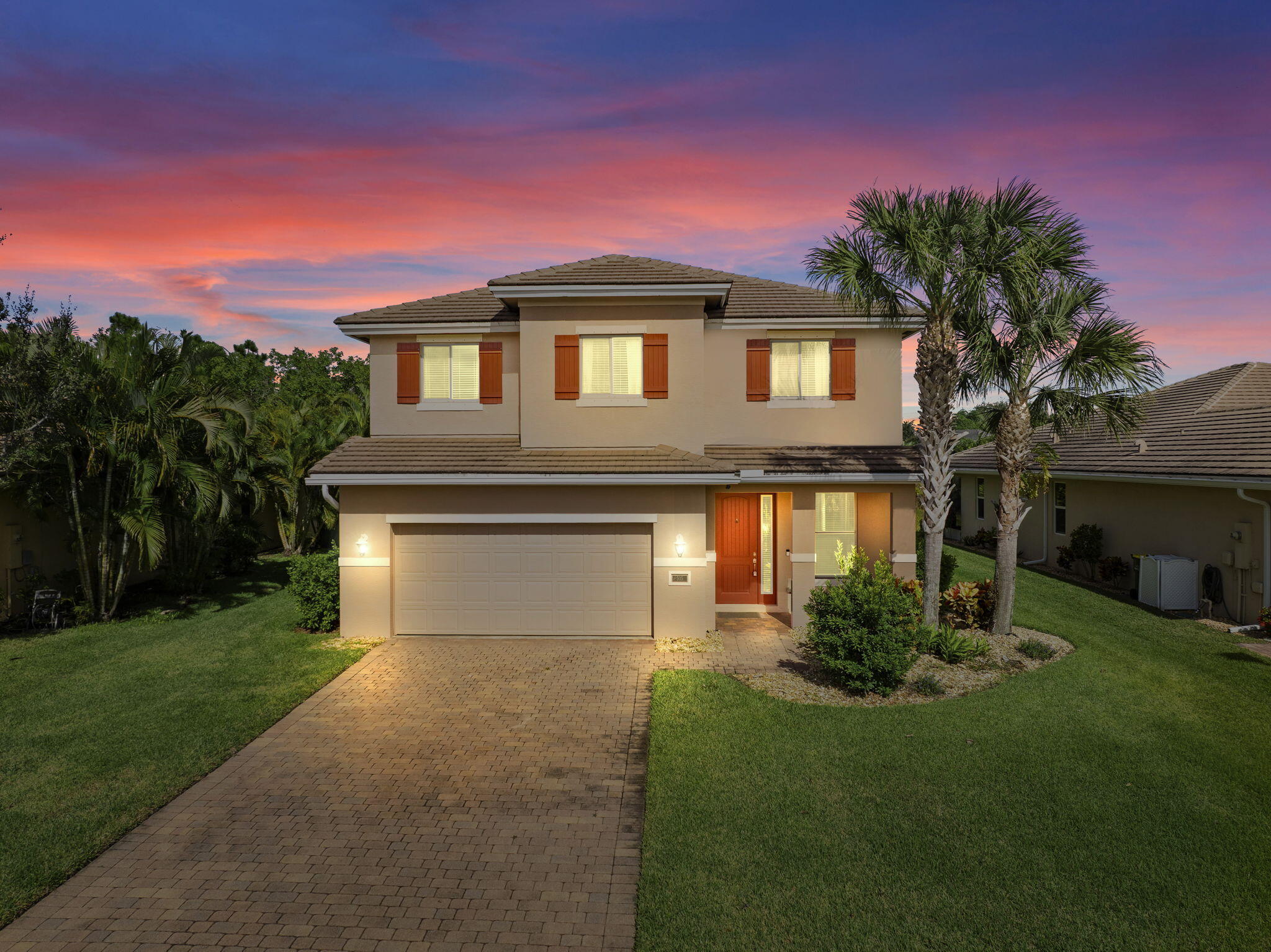 Desirable Pines neighborhood living at its best! Spacious 5-bedroom plus loft, 3.5 bath home offers tranquil preserve views and inviting outdoor spaces, including an open front paver porch, and a screened paver back patio perfect for morning coffee or evening relaxation. Inside, the light-filled floor plan features a center island kitchen with abundant cabinetry, snack bar, breakfast area overlooking the preserve, and a large walk-in pantry. The oversized primary suite includes two walk-in closets, a soaking tub, and a separate shower for a true retreat. The generous yard provides plenty of room for play, pets, and outdoor enjoyment. Just minutes away is Pineapple Park with a 4500 square foot playground, soccer fields, picnic areas, and dog-friendly walking paths.