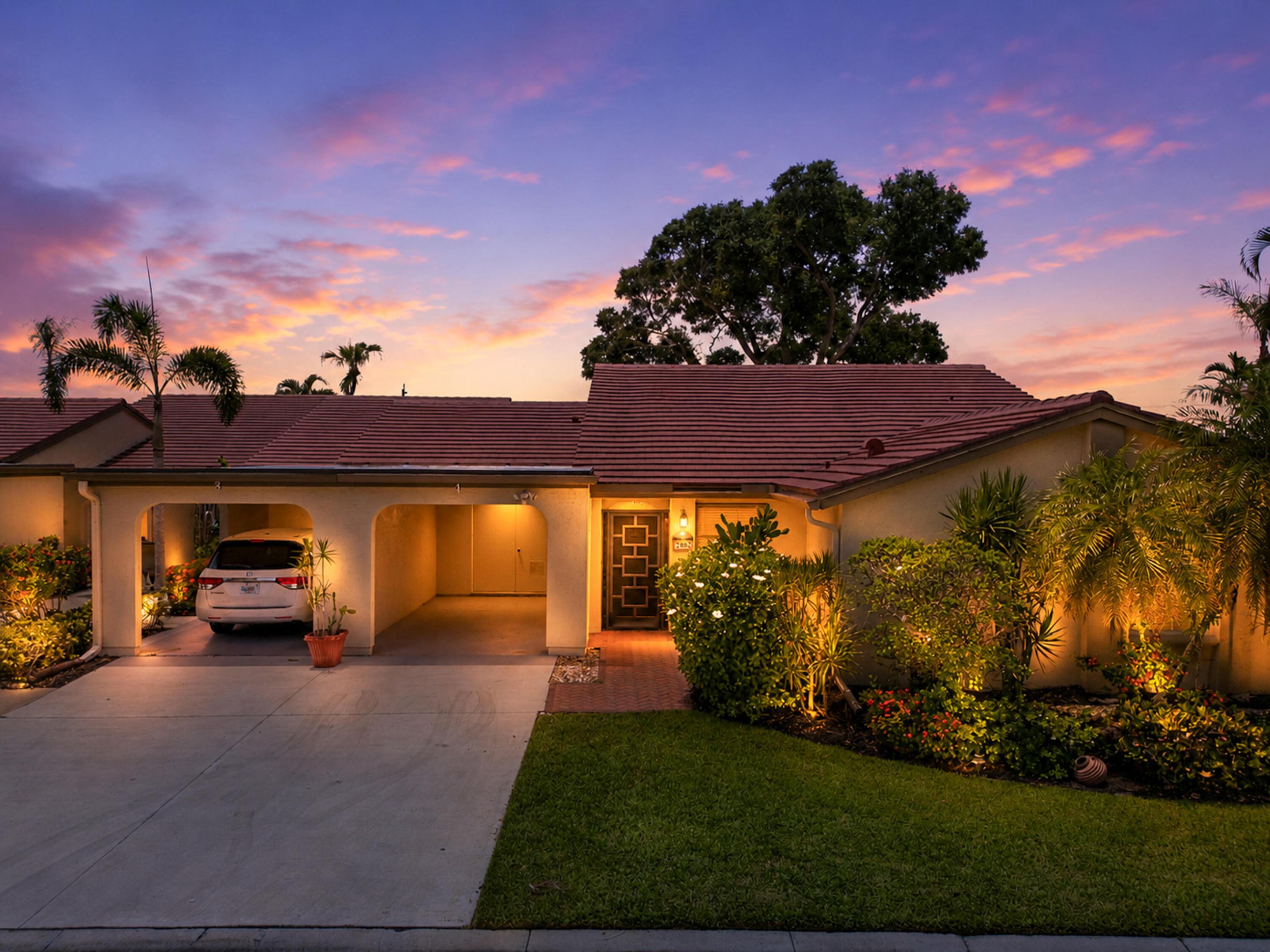 Welcome to this charming villa in Forest Grove Patio Homes, located in Boynton Beach, Florida. This single-story residence offers approximately 1,888 square feet of finished living space with 2 bedrooms a den (can be a 3rd bedroom) two bathrooms & a huge Florida Room providing comfortable accommodation for various lifestyles. The thoughtful layout maximizes livability within an efficient floor plan designed for modern living.  This home offers a new roof, newer shutters, new hot water heater and a lovely golf view. This property presents an excellent opportunity for those seeking a well-proportioned villa with lots of living space in this lovely & established residential setting. The community offers a great pool area & runs lots of events weekly.