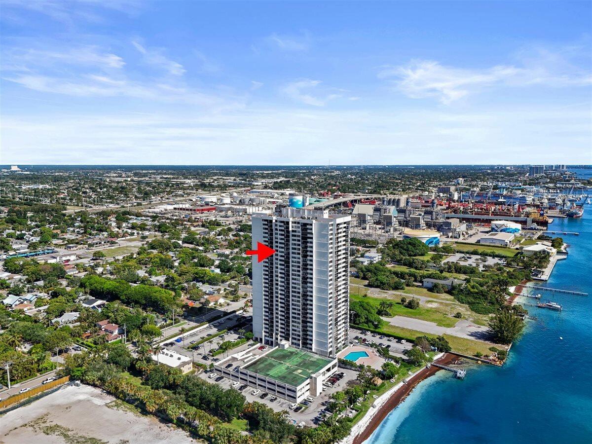 2 bedroom 2 bath condo with views of the Atlantic Ocean, Intracoastal Waterway and Rybovich Super yacht Marina. Freshly painted, brand new refrigerator, oven, dishwasher, microwave, hot water heater, air conditioner, primary bathroom vanity and guest bathroom vanity. Has accordion shutters. Community features resort style amenities,  including a private beach exclusive to this building, a spacious balcony, and a washer/dryer in the unit. The complex also offers a saltwater heated pool, a state-of-the-art fitness center, tiki hut, and beachside barbecue area and fishing pier. Cable, high-speed internet, and water are included in monthly maintenance fees.