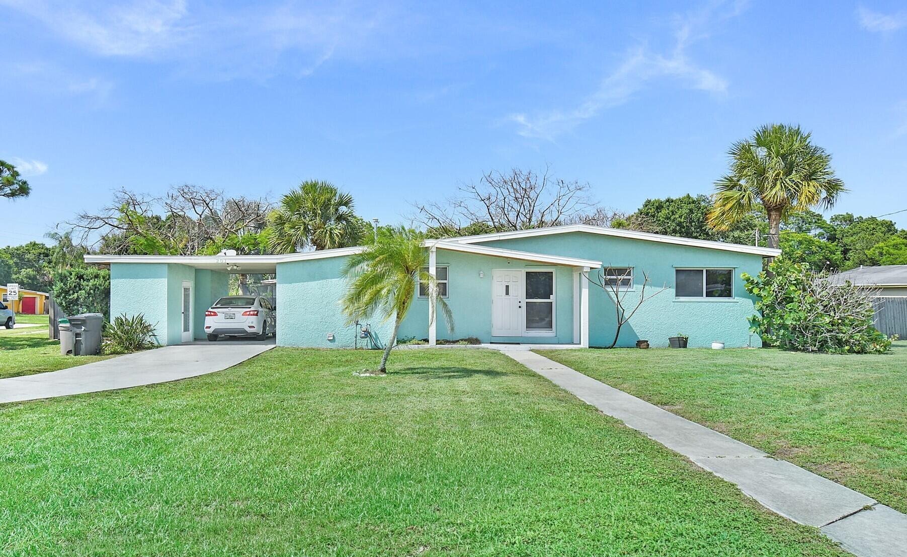 Charming and full of potential, this well-maintained 2-bedroom, 1 bathroom home sits on an oversized corner lot in a convenient Port St. Lucie location with no HOA restrictions. Offering a spacious yard with plenty of room for outdoor living, boat or RV parking, and future possibilities, this property is perfect for homeowners or investors alike. Inside, you'll find a functional layout with abundant natural light and comfortable living spaces ready for your personal touch. Updated kitchen and bathroom.  Original terrazzo floors throughout.  Conveniently located near shopping, dining, schools, parks, and just minutes to US-1 for easy commuting. A great opportunity to own a property with land, flexibility, and value in a growing area of Port St. Lucie.
