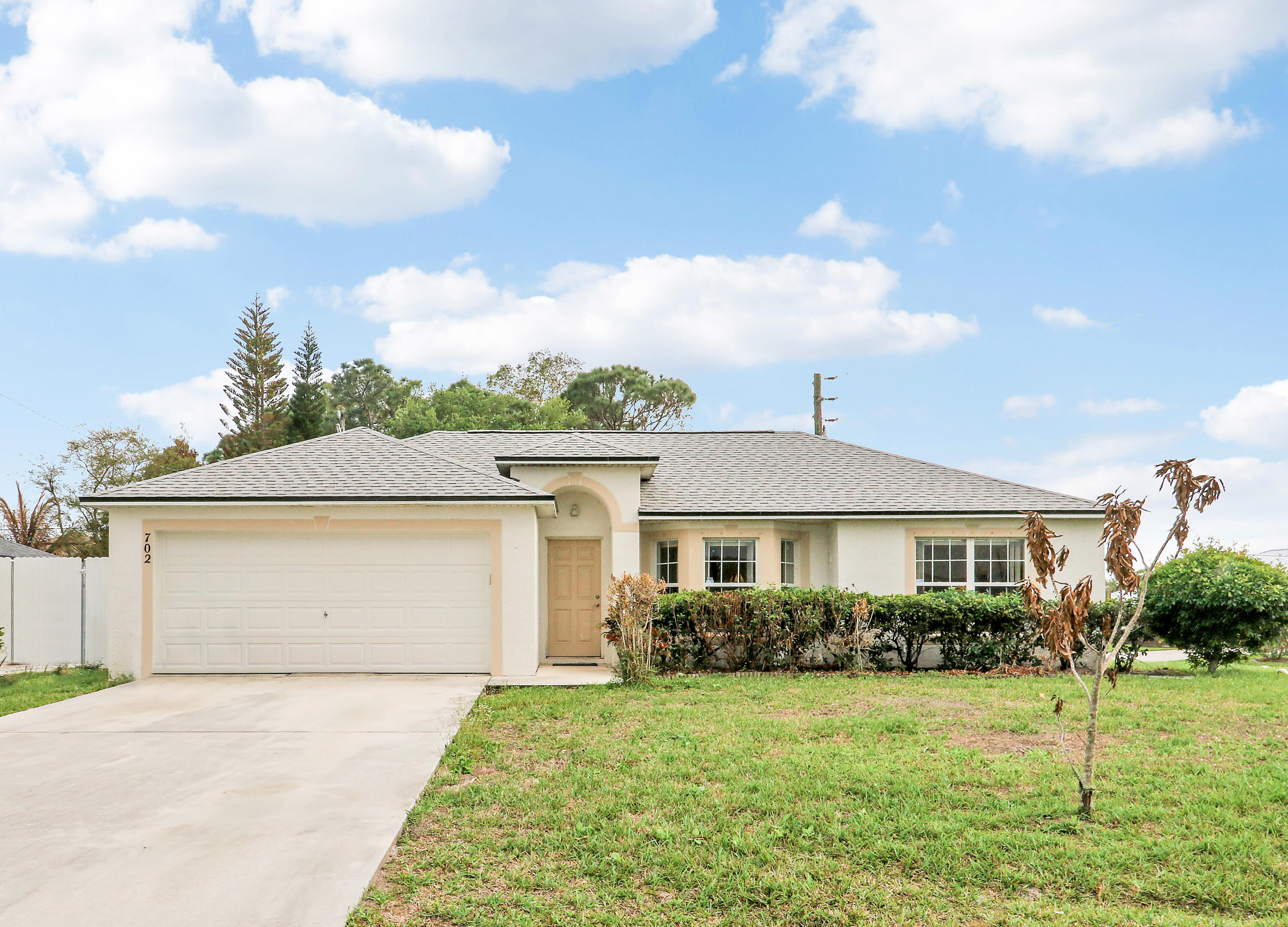 Beautiful 4-bedroom, 2-bath home located in the desirable Floresta area of Port St. Lucie. This well-maintained home features a brand-new roof installed in 2025, a comfortable layout, and a walk-in closet in the master bedroom. Spacious master bedroom. Enjoy outdoor living with a large, spacious patio perfect for relaxing or entertaining. Conveniently located near US-1, shopping, dining, and schools.
