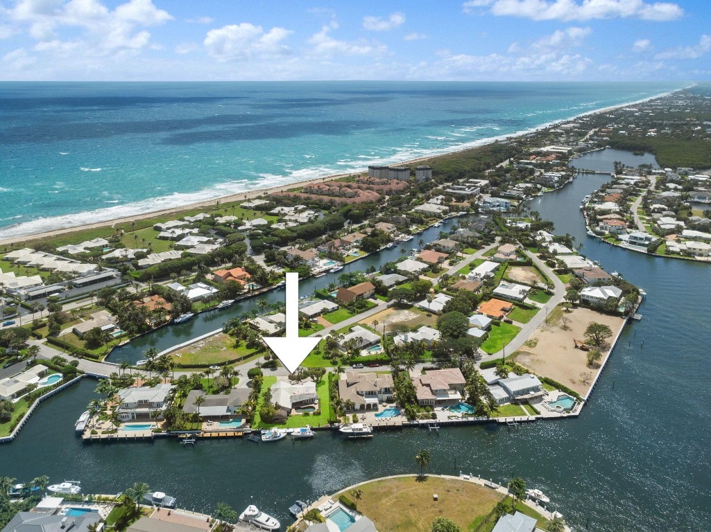 Experience premier waterfront living in the heart of Ocean Ridge! This beautifully updated 3BR/2BA single-story home sits on an oversized 11,000 sq ft lot with 100+ ft of Intracoastal frontage and quick ocean access. Enjoy an open floor plan, split-bedroom design, and a serene saltwater pool ideal for entertaining or unwinding. Boaters will love the private dock accommodating two vessels. Whether relaxing poolside, hosting guests, or cruising the waterways, this home delivers the ultimate coastal lifestyle, a rare chance to own a true slice of paradise.