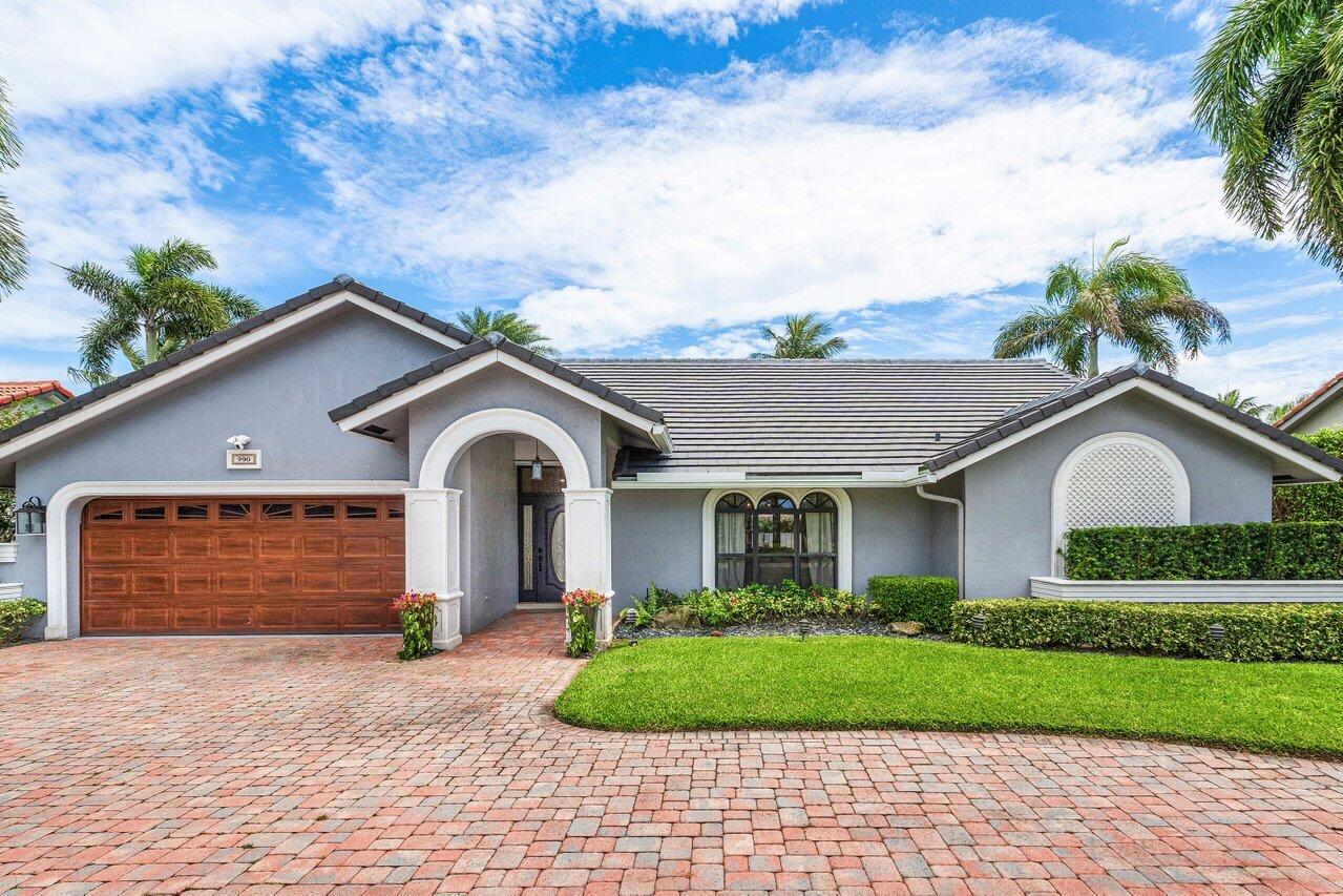 Stunning, fully renovated 4 BD, 2.5 BA residence situated on an exceptionally spacious lot in East Boca Raton. Designed for both comfortable everyday living and effortless entertaining, the home features an open concept floor plan enhanced by soaring cathedral ceilings, abundant natural light, and French doors that seamlessly connect the interior to the outdoor living spaces. Two separate living areas, anchored by a dedicated dining space, provide flexibility for gathering, hosting, or relaxing. The beautifully updated kitchen overlooks the main living area, creating an inviting and social atmosphere while showcasing stainless steel appliances, upgraded finishes, and a large center island with seating.  The primary suite embraces the indoor-outdoor lifestyle with French doors opening directly to the patio and pool area. Its renovated bathroom offers a spa-like retreat, complete with chic designer lighting, elegant finishes, and a luxurious soaking tub. Three additional bedrooms provide ample accommodations, including one with direct outdoor access, while an updated cabana bath adds convenience for poolside living. Outdoors, discover a private tropical oasis featuring a covered patio ideal for alfresco dining, a sparkling pool, a spacious tiki hut with a full outdoor kitchen and seating area, and an expansive yard with plenty of room for recreation and relaxation. Conveniently located in East Boca Raton, the home is just minutes from I-95, the beach, shopping, dining, Downtown Boca Raton, and Town Center Mall.