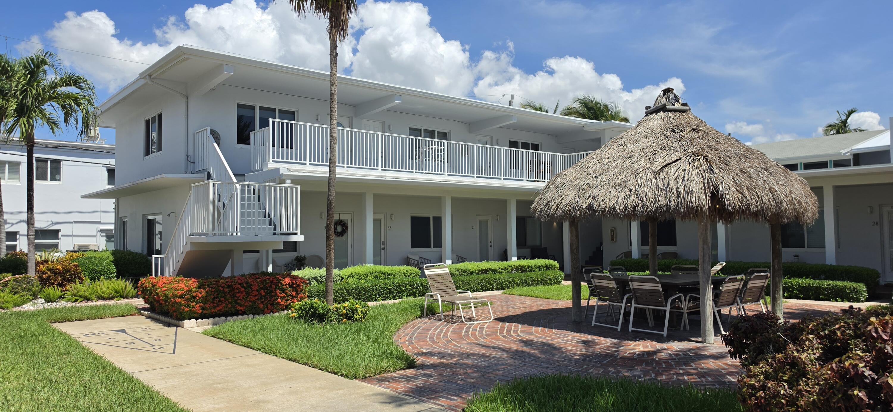 Welcome to this furnished studio corner unit with an ocean view located in the heart of Lauderdale-By-The-Sea!  Beautiful wood-look tile floors and newly updated kitchen & bath.  An excellent investment opportunity for buyers looking for an affordable entry point into Lauderdale-By-The-Sea which allows leasing after just 1 year of ownership up to 5X per year with a 30 day minimum.  The grounds offer a heated pool, a balcony out your front door which is perfect for your morning coffee with a view of the ocean, & a tiki hut just downstairs. Features a brand new A/C & electric panel, newer water heater and impact windows. Literally, just steps to the ocean and the dining, entertainment and recreation offerings in the quaint town of LBTS.  Snorkel the world famous reef just outside your door!
