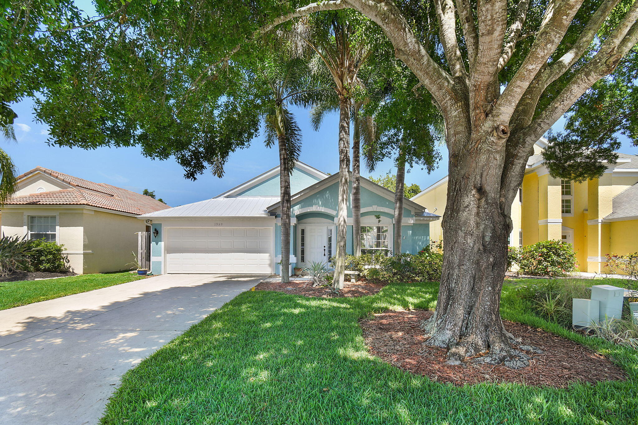 This beautiful 4-bedroom, 2-bath pool home is located in the highly desirable Pineapple Plantation community. Meticulously maintained, this home offers both comfort and style throughout. The remodeled and expanded kitchen provides endless counter space, making it a dream for baking enthusiasts and home chefs alike. The spacious primary suite features a luxurious bath with a deep soaking tub and a walk-in shower, creating a true private retreat. The home features ceramic tile and vinyl plank flooring for easy maintenance & modern appeal. Step outside to enjoy the inviting saltwater pool, perfect for summer relaxation. The covered cabana, complete with a cedar tongue-and-groove ceiling, offers an ideal space for entertaining. Accordion shutters provide added peace of mind.  Conveniently located near shopping, dining, beautiful beaches, and A-rated schools, this move-in-ready home is waiting for its new owner.