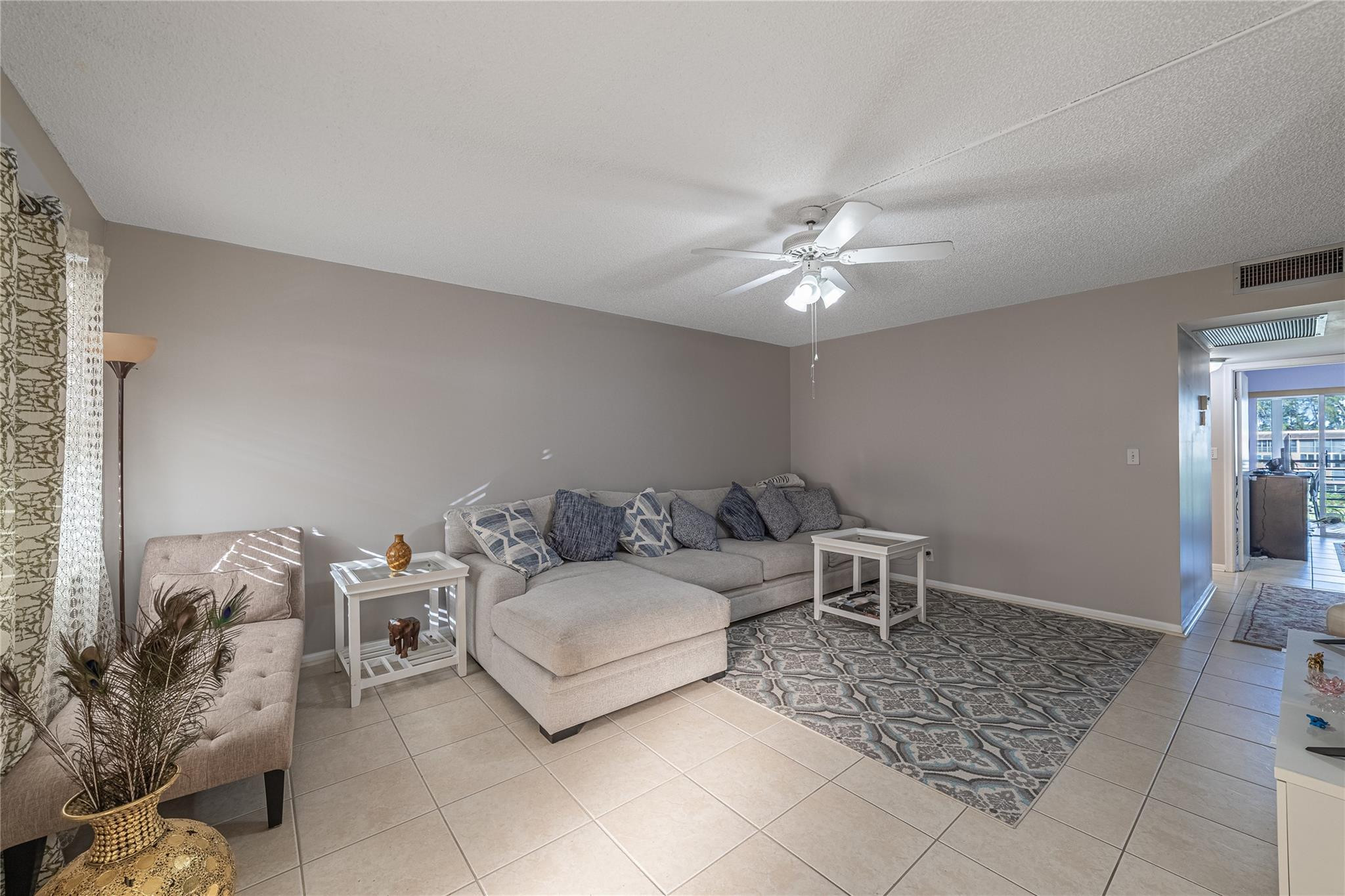 Lake view. Clean, move-in condition. No leasing first 2 years, no pets. 55+ Community, (1 Occupant must be 55) Gated Community offering a non-membership country club lifestyle heated pools, fitness center, tennis courts & pickle ball courts, Restaurant, Courtesy buses and much more! Association requirements: 20% down, 700 credit score, (1) vehicle assigned parking space.