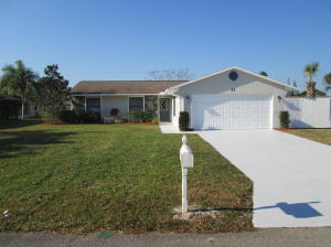 River and ocean access on a budget!  Cute as can be, updated 3/2/2 with access from the community boat ramp!  Nice, quiet community.  Partially updated kitchen and baths.  Spacious living room/dining room area.  Breakfast nook off the kitchen.  Home has lots of personality and curb appeal.  Room to store boat or RV.  Won't last long!