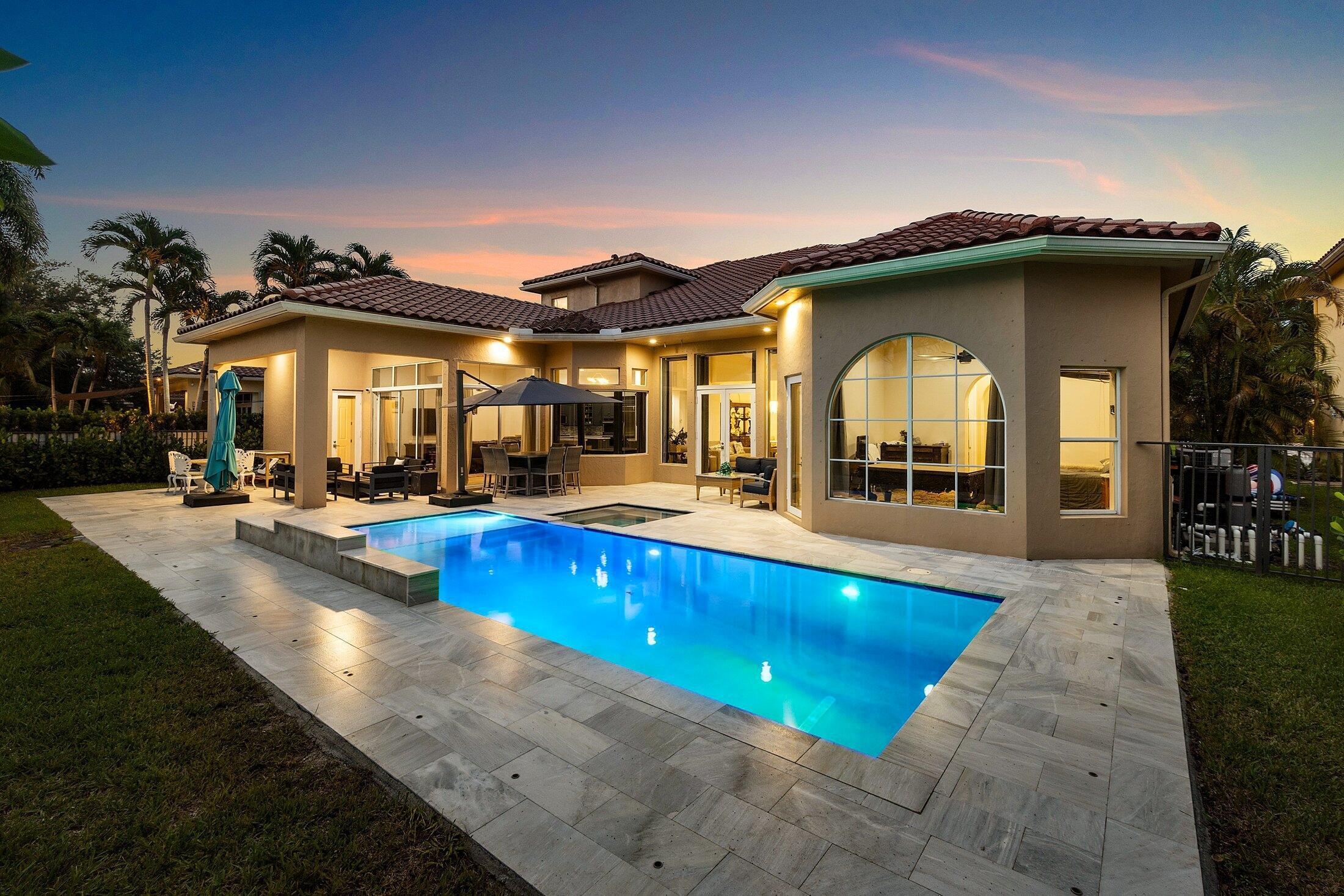AMAZING - 6 Bedroom Estate home in the prestigious community of Talavera! This expansive 2-story home features a 1st-floor master suite, soaring 20-ft ceilings, and a large loft upstairs. The open-concept kitchen is equipped with newer quartz countertops, custom painted wood cabinetry, backsplash, and double ovens. Bathrooms feature quartz vanities, modern fixtures, updated lighting, a 3-car garage, and 3-zone A/C with a dedicated unit for the master. The newly built pool includes LED color lights, a salt chlorinator, heater, and remote control for effortless enjoyment. The community is just 5 minutes to National Polo Center, Dining, Shopping and all of the amenities that South Florida and the Wellington Equestrian Community have to offer! Some Pix Virtual