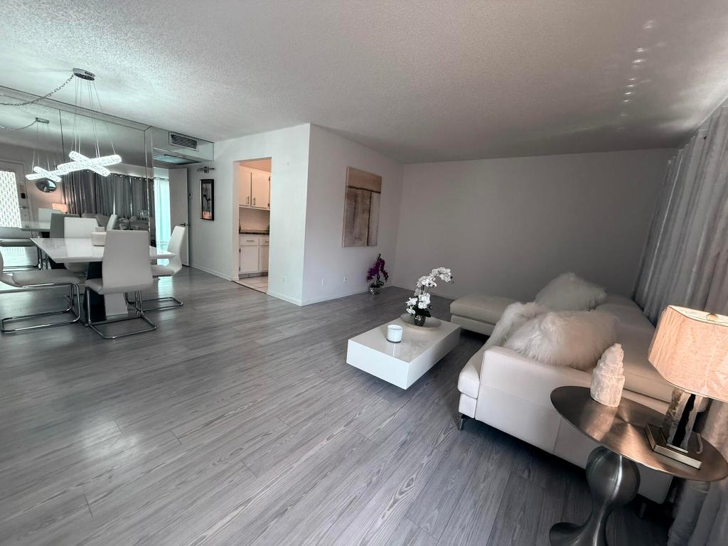 Step into this totally renovated 1-bedroom, 1-bathroom condo and prepare to be impressed! Featuring stunning wood flooring throughout and a sleek, modern kitchen, this unit blends comfort with style. Located in a vibrant community offering top-notch amenities including a clubhouse, theatre, and a picturesque golf course, this home is perfect for those seeking a peaceful retreat or a chic space to entertain. Don't miss your chance to own a beautifully updated piece of paradise in Pembroke!
