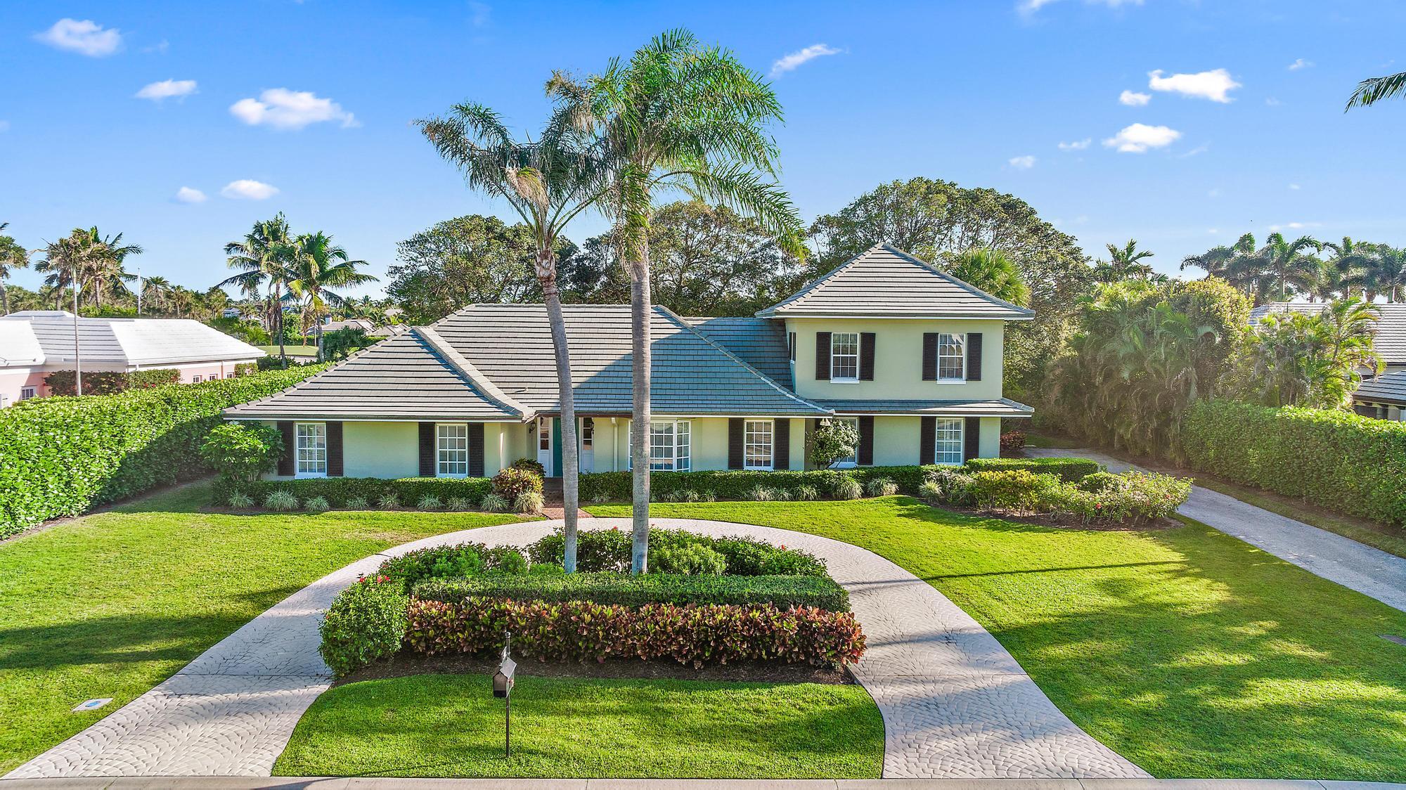 Fantastic opportunity on the 6th fairway in the exclusive enclave of Lost Tree Village.  
The home is nestled in a quiet area of the community, conveniently located between the beach club and the main clubhouse. Huge potential awaits a discerning buyer. Whether you want to renovate or build new, this .4110 acre lot has untapped potential, and plenty of room for a pool. Don't miss this opportunity to create something special.