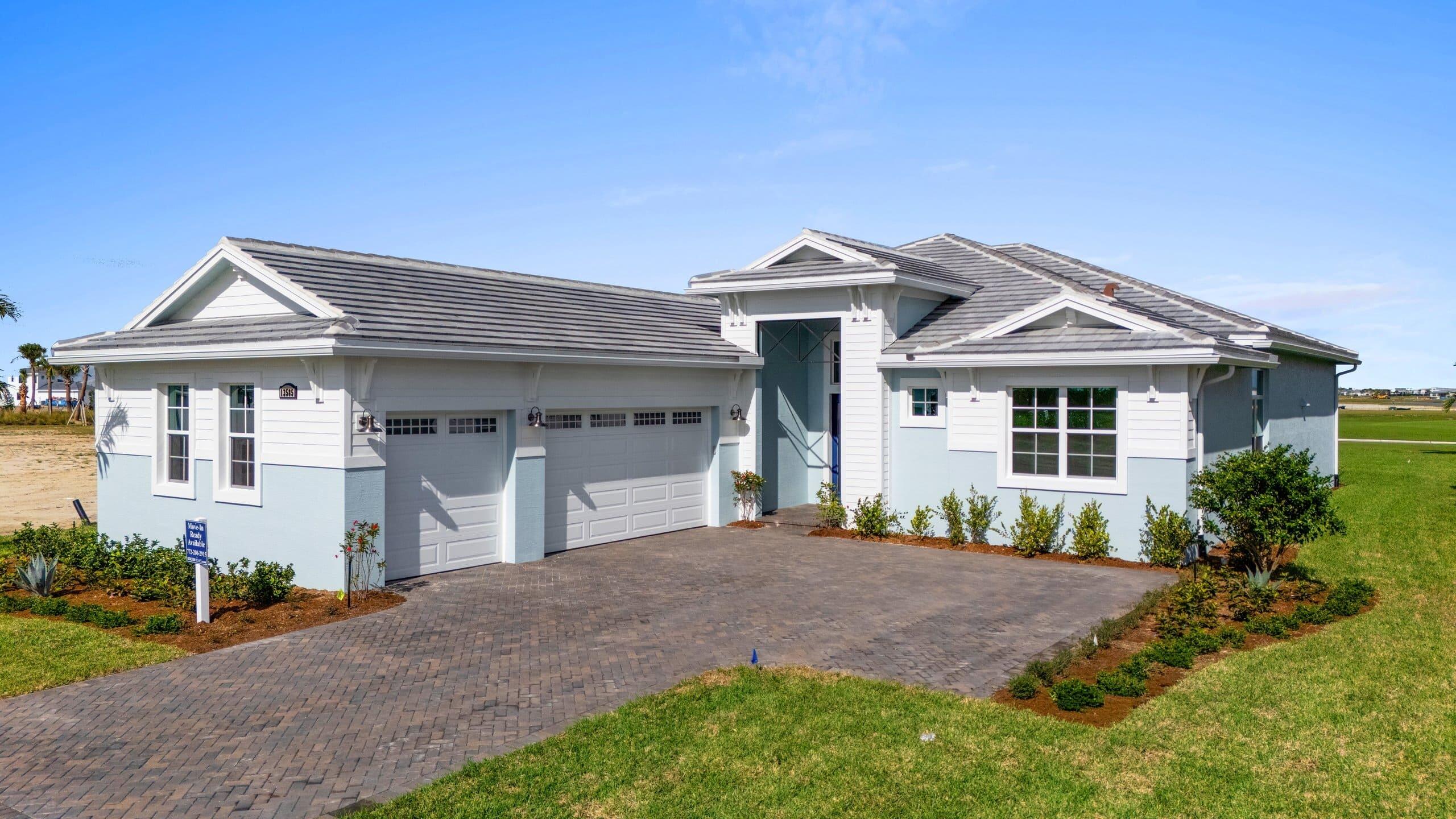 Move-In Ready! Discover this beautifully designed 3 Bedroom + Flex Room, 3.5 Bath home in Astor Creek Golf & Country Club, offering an open layout and beautiful golf course views. The Chef's Kitchen showcases a Monogram appliance package, 48'' built-in refrigerator, 36'' designer hood, Level 5 cabinetry with second-tier uppers, under-cabinet lighting, and a Moen single-bowl granite sink. Main living areas and bedrooms feature Mohawk Castle Cove Sand Pearl Oak flooring, while a 12'x10' sliding glass door opens to a Covered Lanai with Summer Kitchen. A 3-car garage, upgraded baths, and designer finishes throughout make this home the perfect blend of style and functionality.