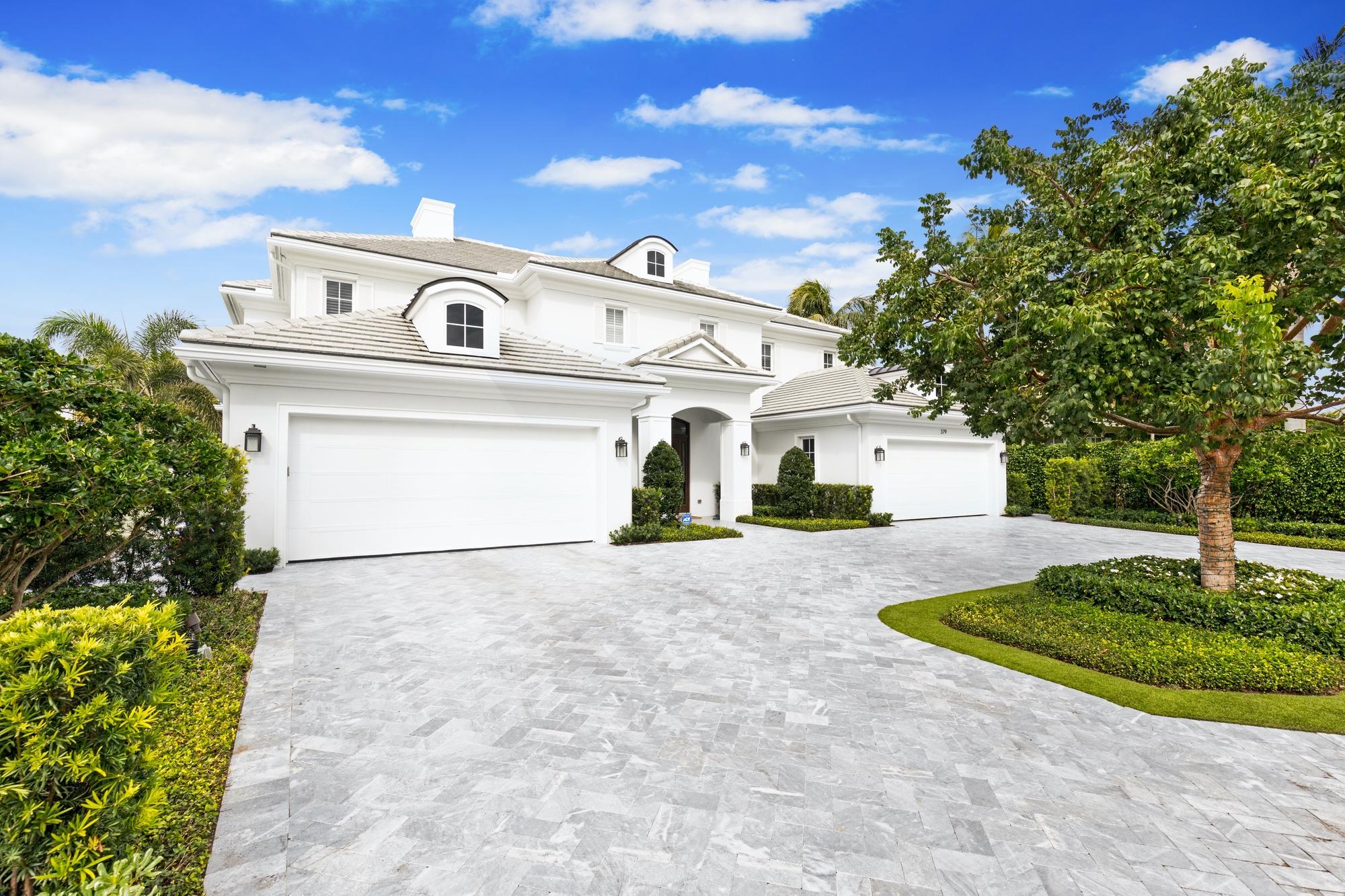 Amazing newer construction ''British West Indies style'' home by Muir Yeonas Homes.  Features include stunning decor by Decorators Unlimited, Savant smart home technology, chefs kitchen, wine cellar, exercise room, screened in loggia, swim up bar, 4 car garage and much more.