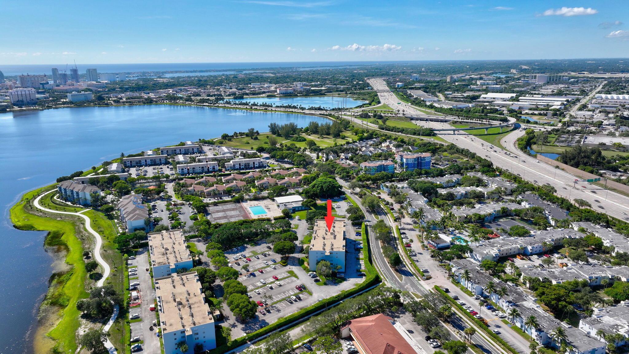 Easily one of the best-priced opportunities in Palm Beach County! Welcome to this beautifully updated 2-bedroom, 2-bathroom condo located in a desirable gated community in the heart of West Palm Beach. This bright and inviting unit offers a thoughtfully designed layout with abundant natural light and modern upgrades throughout. The spacious primary suite features a generously sized bathroom and a walk-in closet, providing both comfort and functionality. The unit has been completely renovated, including a BRAND NEW impact sliding glass door currently being installed—adding both style and peace of mind. Perfect for investors, this property is already rented to a reliable tenant, offering immediate cash flow from day one. The community itself is undergoing exciting renovations, including updates to the buildings, a refreshed pool area, upgraded tennis and pickleball courts, and the addition of a dog park—enhancing both lifestyle and long-term value. Location is everything, and this condo truly delivers. Ideally situated just minutes from the Palm Beach Outlets, PBI Airport, pristine beaches, and the highly anticipated NORA District, you'll enjoy easy access to shopping, dining, entertainment, and travel. Whether you're looking for a smart investment or a future place to call home, this move-in-ready condo checks all the boxes.
