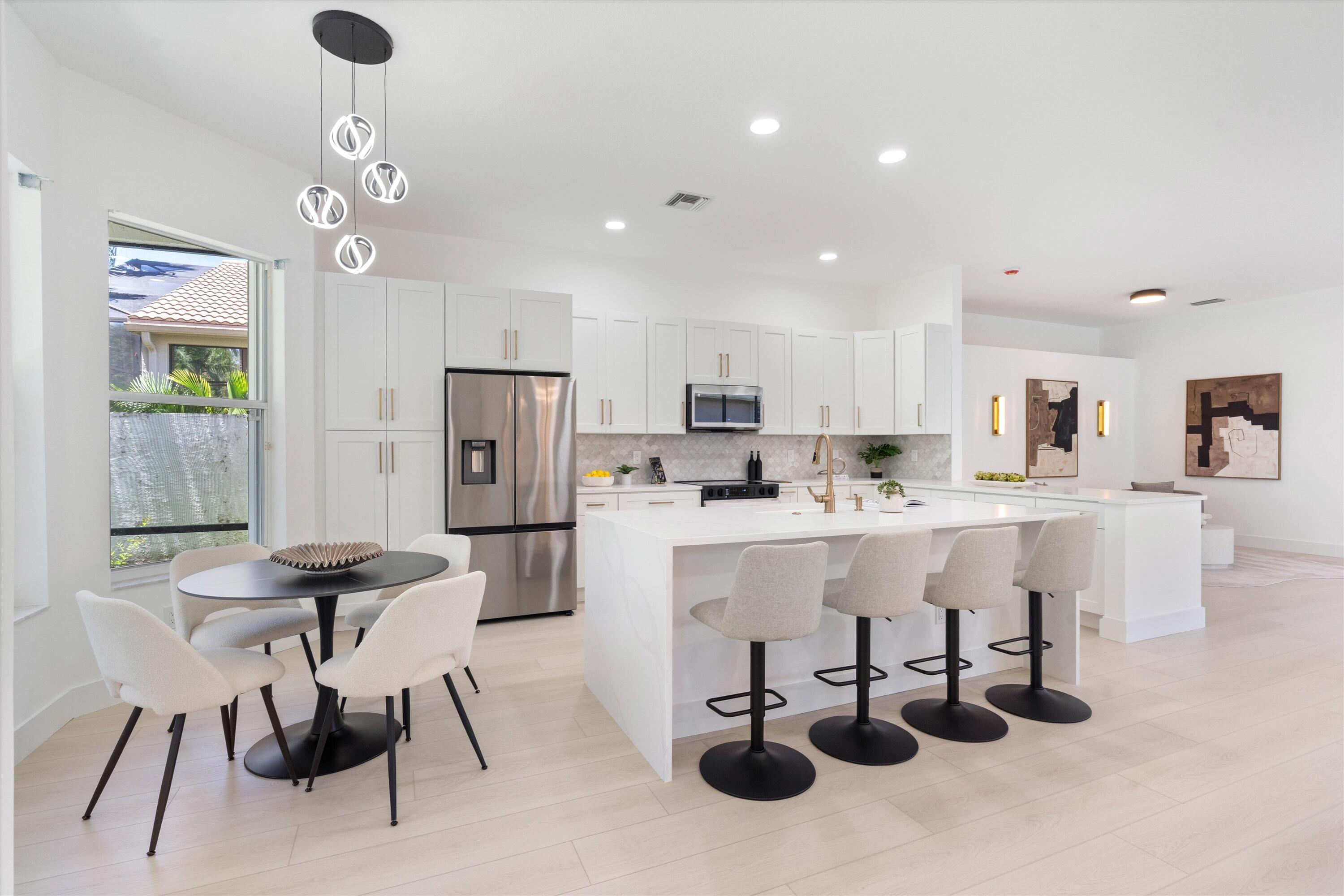 Beautifully renovated 3-bedroom, 2-bath home offering modern style and move-in-ready convenience. This tastefully redesigned property features a brand-new roof, freshly painted exterior, and an epoxy-coated garage floor for a clean, polished finish. Inside, the entire home has been thoughtfully updated with contemporary touches, creating a bright and inviting atmosphere throughout. Enjoy spacious living areas, updated finishes, and a seamless blend of comfort and style. Perfect for buyers seeking a turnkey home.  Valencia Falls offers resort-style living with exceptional amenities designed for recreation, wellness, and social connection. A beautifully appointed clubhouse, pickleball courts, fitness center, swimming pools, on-site dining, and a full calendar of activities and events.
