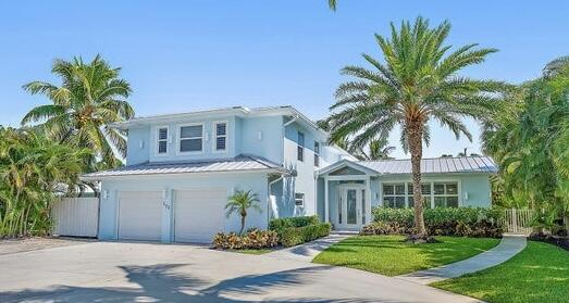 BRING YOUR BOATS!! STUNNING WATERFRONT HOME - COMPLETELY REMODELED!! LOCATED IN THE HIGHLY SOUGHT AFTER NORTH PALM BEACH VILLAGE! This gorgeous 4 bedroom, 4.5 bath home will not disappoint! Two beautiful master bedrooms (one main level) Awesome kitchen, amazing master bedroom suite on the first floor with enormous closet. Large sundeck/balcony off the upstairs master bedroom and great living space throughout the home. Separate entertainment loft upstairs. Beautiful backyard with pool and hot tub. Covered lanai includes a great bar and seating area - fantastic outdoor space to enjoy the Florida lifestyle! Property has 80 feet of water frontage. Includes TWO boat lifts, AND space on the dock for an additional 40 ft boat. Beautiful backyard with exquisite landscaping and lightin The heated salt water pool has a beach entry with waterfall and hot tub. Fantastic play area for the kids with swings and slides. Basketball hoop and a fire pit surrounded with lounge chairs.

This property is unlike any other you will see! Take the boat to local waterfront restaurants and fish the waters of some of the best fishing Florida has to offer!! Bring your clubs to play the Jack Nicklaus signature (public) golf course at the newly renovated North Palm Beach Country Club. The club also boasts an olympic size pool, world class tennis facility (Har-Tru courts) and an excellent Farmers Table restaurant. Don't miss out on this rare find!