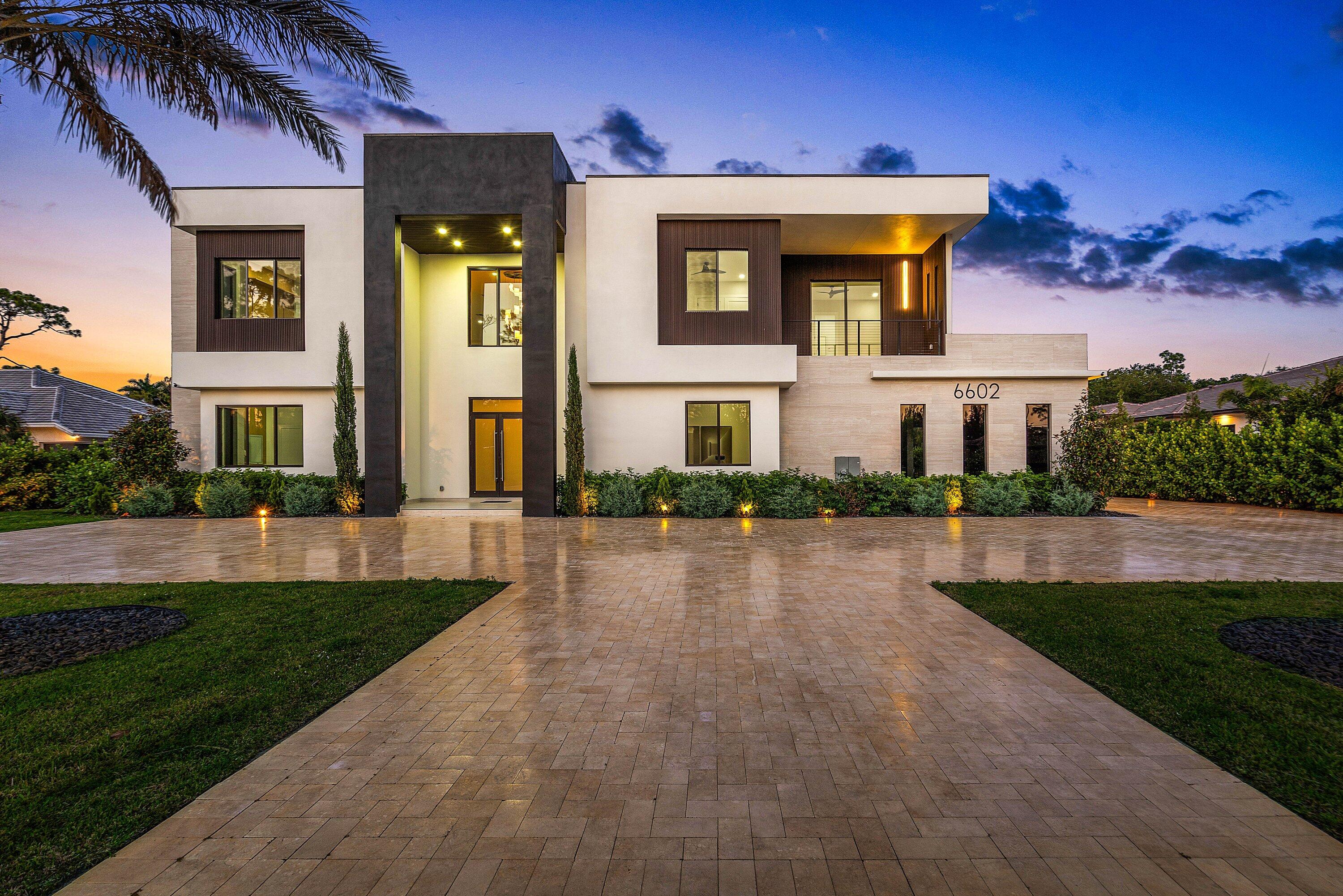 Brand-new luxury estate on over half an acre in Parkland with no HOA! Featuring 7 ensuite bedrooms and 8.5 bathrooms, this residence delivers exceptional scale, privacy, flexibility and luxury. A dramatic open-concept layout is anchored by a chef's kitchen with four ovens and premium finishes, designed to handle everything from daily living to large-scale entertaining. The floor plan is built for versatility, offering multiple primary suites (including one on the main level), two laundry rooms, a mudroom, & extensive storage. Upstairs, a dedicated entertainment lounge with a full bar creates a true second living space. The outdoor setting is spectacular—resort-style pool and spa, summer kitchen, cabana bath, covered dining, expansive patio, & large upper balcony.  Three car garage... Three-car garage. No HOA. New construction on usable land in one of Parkland's most desirable areas. Add a guest house or tennis court! Zoned for top-rated schools and minutes from golf, parks, dining, shopping, and South Florida beaches. Properties offering this combination of size, condition, and freedom are limited—schedule your private showing today.