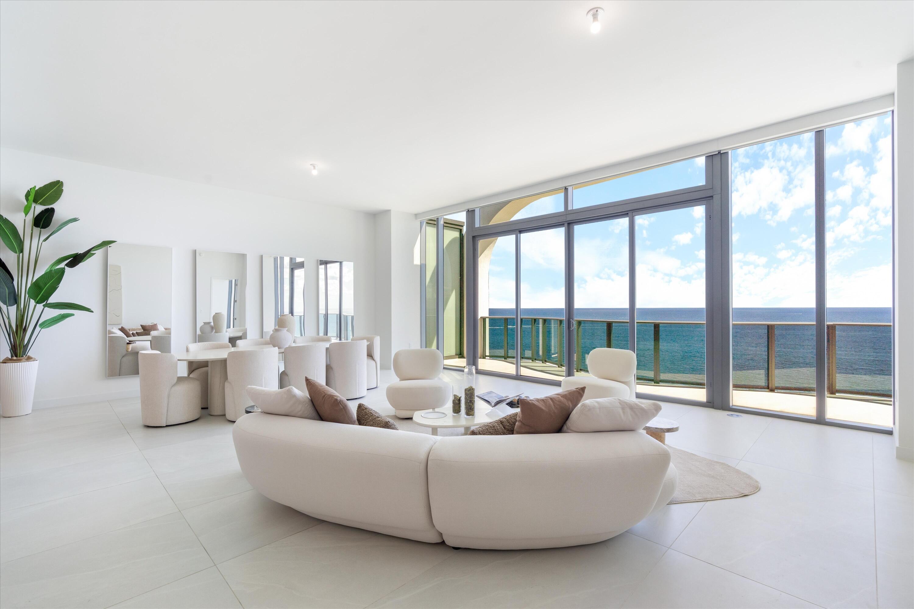 Experience unparalleled oceanfront living at Casamar, Pompano Beach's newest luxury condominium. This spacious 4-bedroom, 4.5-bath plus den residence offers up to 11 ft. ceilings, 3,300 sq. ft. of interior space and 562 sq. ft. of outdoor terraces, totaling 3,862 sq. ft. of exquisite coastal living. The flow-through layout features floor-to-ceiling glass showcasing breathtaking Atlantic Ocean and Intracoastal views, perfect for enjoying both sunrises & sunsets. Elegant upgrades include porcelain flooring, custom Italkraft kitchen cabinetry, and Wolf and Sub-Zero appliances with a natural gas cooktop. Enhanced with premium technology, the residence features a Lutron lighting system, Lutron motorized shades, a Sonos audio package, and an Eero network package for seamless smart-home integration. A private storage unit adds convenience. Residents of Casamar enjoy resort-style amenities including sunrise and sunset pools, a state-of-the-art fitness center, pickleball court, golf simulator, spa, game room, and sunrise and sunset lounges, along with full pool and beach service. Ideally located within walking distance to shops and dining, this remarkable residence offers the very best in luxury oceanfront living.