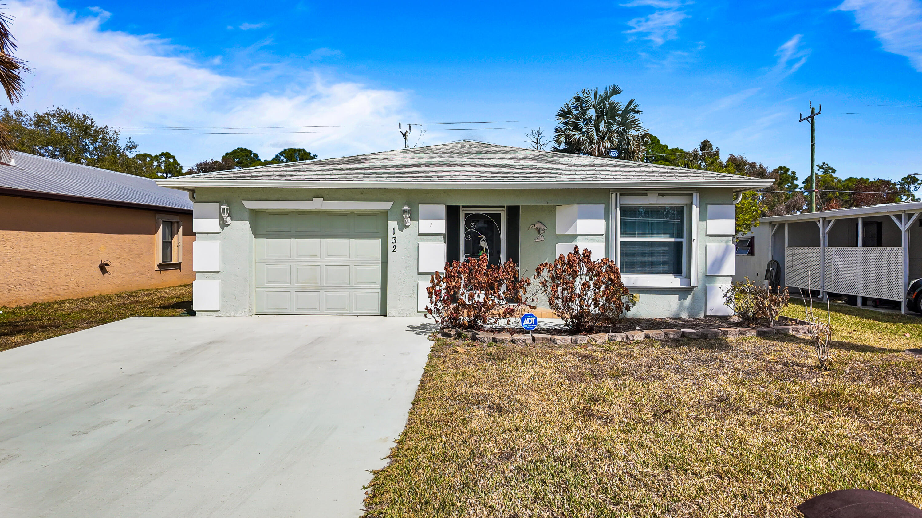 Beautifully maintained CBS home in Spanish Lakes One, an active 55+ community. This move-in ready 2 bedroom, 2 bath home features an open floor plan with spacious living and dining areas, plus a 1-car garage. Enjoy added privacy with canal views behind the home. No HOA fees -- just the monthly land lease that covers lawn care, trash removal, and full access to resort-style amenities.  Residents can enjoy a 9-hole golf course, two swimming pools, tennis, pickleball, bocce, horseshoes, shuffleboard, billiards, fitness center, clubhouse, party room, library, game room, dog park, and more.  All buyers must be approved by Spanish Lakes. Call for application details and to schedule your private showing!