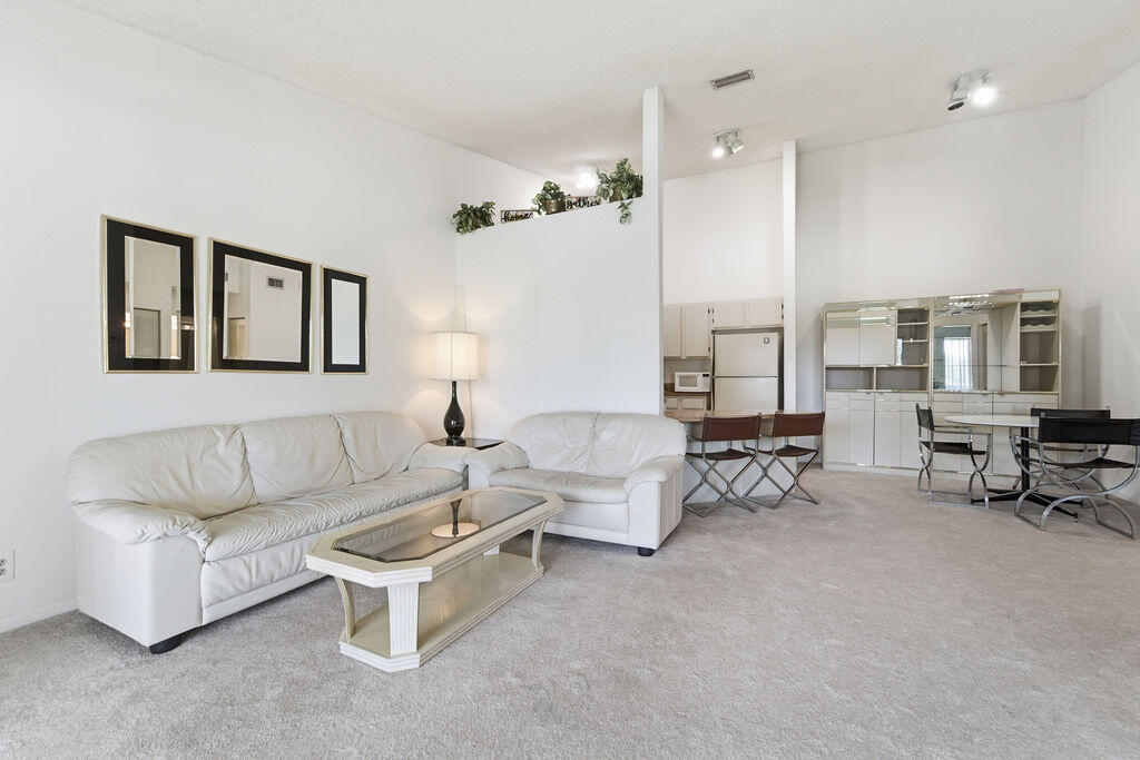 Welcome to Chasewood North in the heart of Jupiter! This beautifully maintained 2-bedroom, 2-bath furnished condo offers spacious living with soaring vaulted ceilings and an oversized screened balcony perfect for relaxing or entertaining. Enjoy the convenience of being just a short walk to the community pool and tennis courts. Ideally located near shopping, restaurants, parks, hospitals, and Jupiter's beautiful beaches, with easy highway access just minutes away. Whether you're looking for a full-time residence, seasonal getaway, or investment opportunity, this condo offers the perfect blend of comfort, convenience, and location.