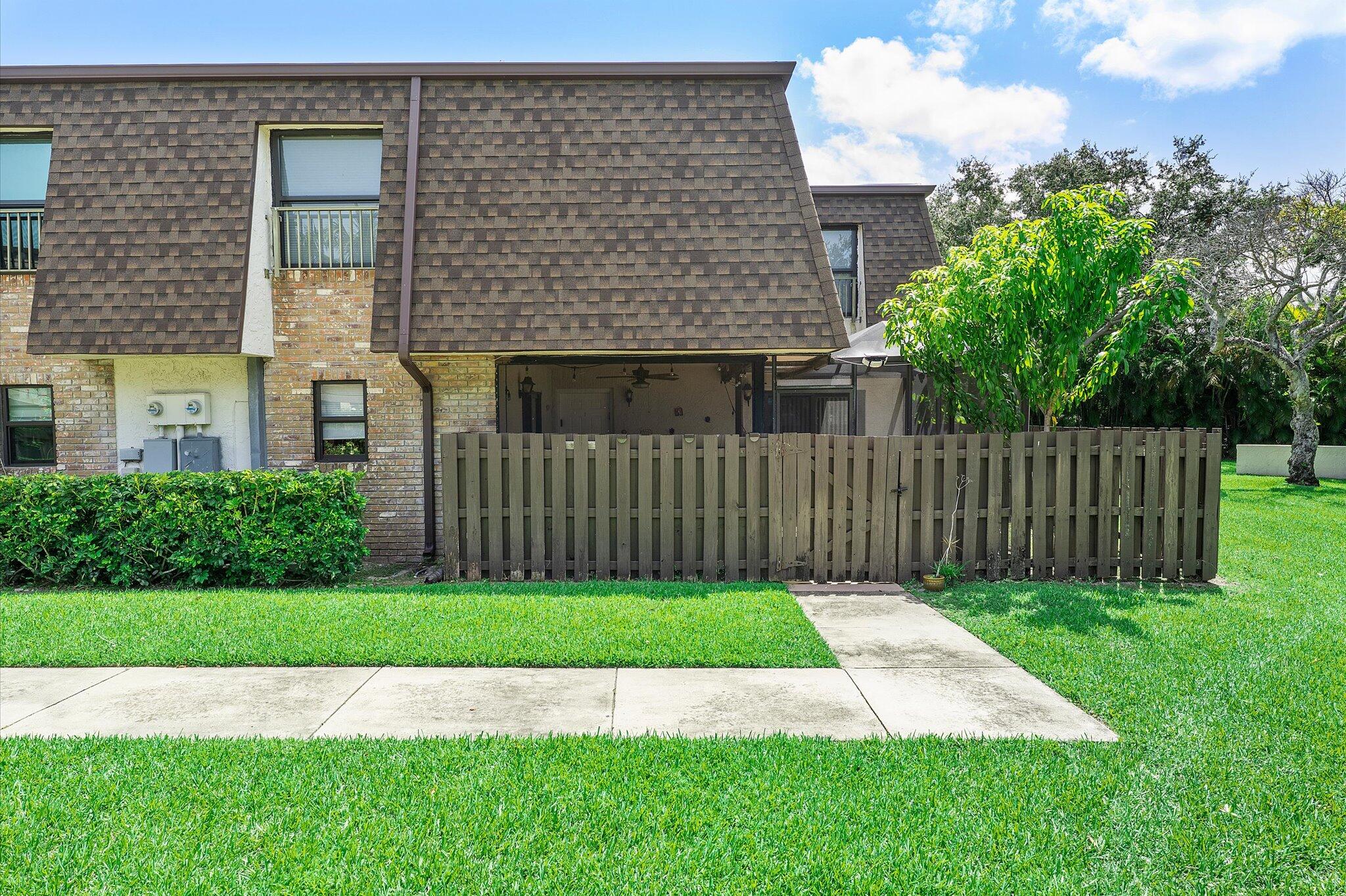 Welcome to this inviting corner-unit townhouse in the desirable Parkside subdivision. Centrally located in Coral Springs, this bright and private home offers a wonderful layout featuring tile and laminate wood flooring throughout. The main level provides a seamless flow for daily living and entertaining, complete with a convenient half bathroom. Upstairs, you will find three bedrooms and two full bathrooms. Head outside to a large screened patio, perfect for relaxing in the fresh air. Enjoy total peace of mind with a brand-new roof and AC, impact windows, new window treatments, and an updated guest bath alongside refreshed toilets in both bathrooms. Residents can also enjoy the community pool just moments from the door.  Positioned across from the beautiful Mullins Park, this property ensures recreational options are always close by. Enjoy effortless access to local shopping, dining, and medical facilities. It is a fantastic place to call home.