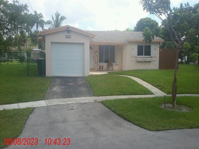 Welcome to this charming single-story residence in Lauderdale Lakes North Gate, offering 1,208 square feet of comfortable living space. This 2-bedroom, 1-bathroom home sits on a waterfront property, providing a unique connection to the water. The single-car garage offers convenient covered parking and storage solutions. Located in the established Lauderdale Lakes North Gate community in Lauderdale Lakes, FL, this property presents an excellent opportunity for those seeking waterfront living in a well-established area.