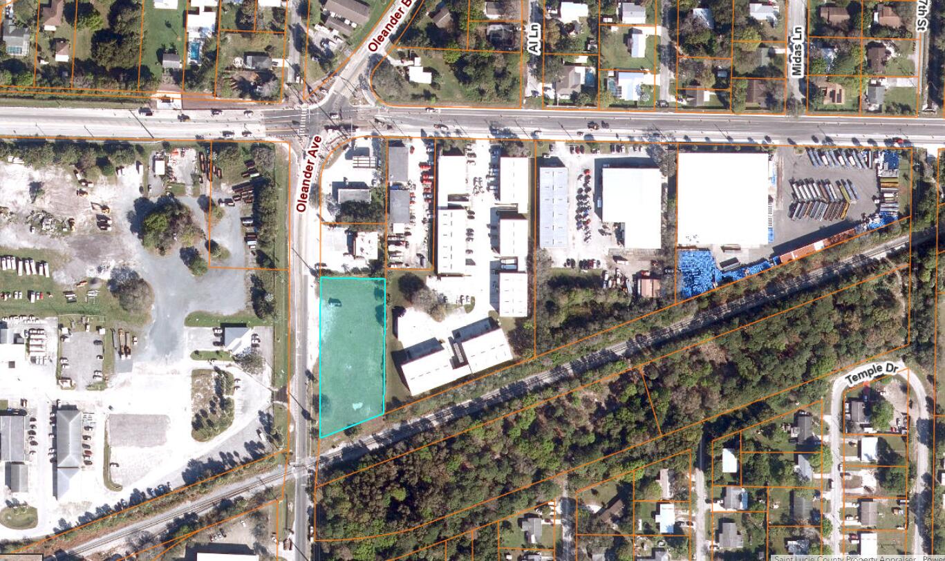 Prime Commercial/Industrial Opportunity in South Fort Pierce!  This 1.16-acre site offers outstanding visibility with 371 feet of frontage on Oleander Ave and 150 feet of depth. The site has General  Commercial zoning with Industrial Land Use.  The property is high, dry, and mostly cleared , with municipal water, sewer, and gas available (see utility map in photos). Extensive due diligence materials are on hand, including survey, topo, Phase I environmental, and geotechnical reports, giving a head start on development. The owner has completed a detailed site plan and engineering for a two-story warehouse with offices, designed with a French drain system under the parking lot. Ideal for a 12,000-15,000 SF project, this property is ready for your next commercial or industrial build Adjacent to a 7-11 C-store and across the street from St Lucie County's road & bridge dept, County Parks Maintenance compound and more.  Significant commercial and industrial development in this area.,