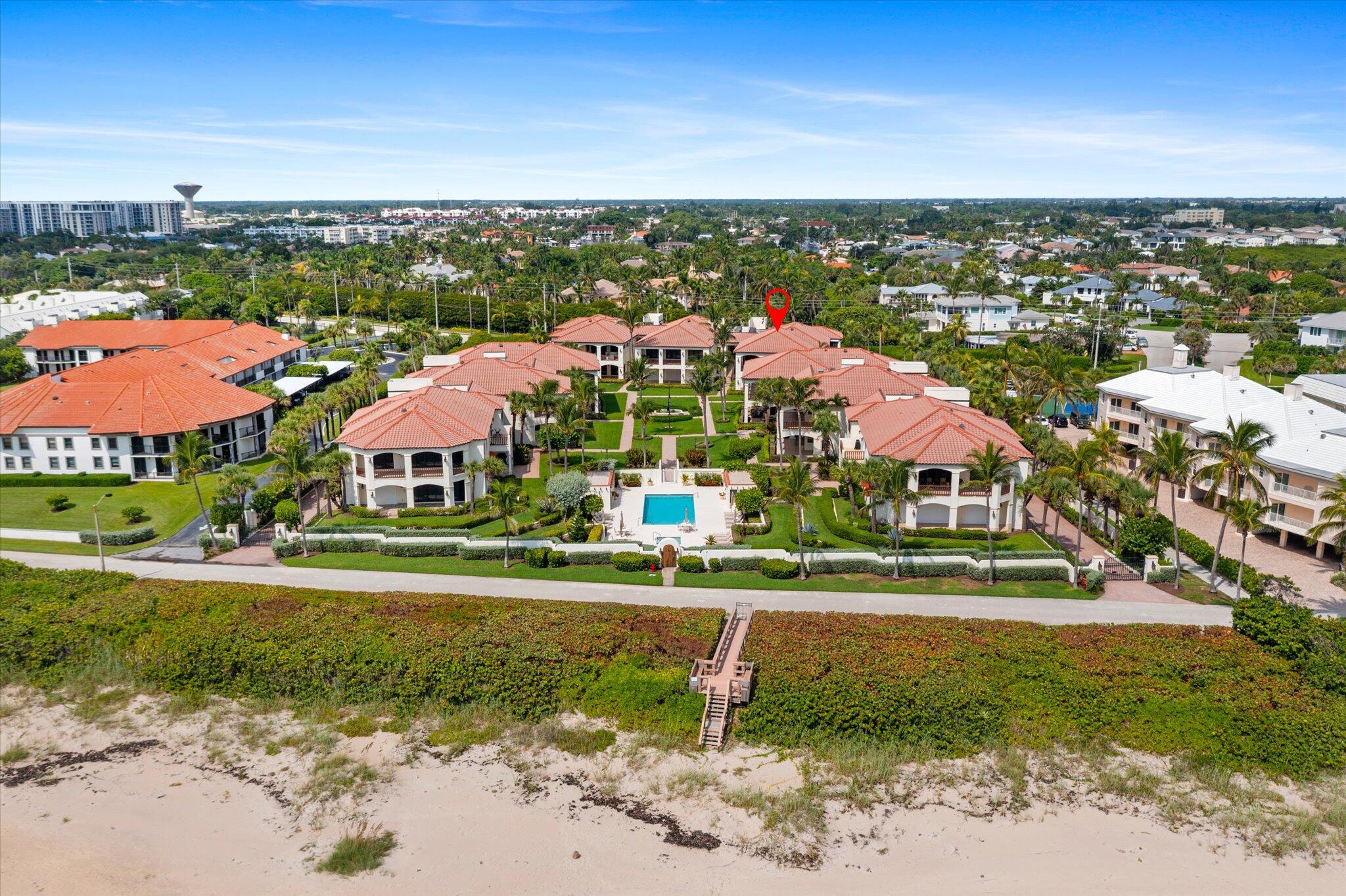 Luxurious 3BR/2.5BA residence in the exclusive boutique gated enclave of Portofino of Ocean Ridge. One of the largest & rarely available floor plans with nearly 3,000 sq. ft., featuring an enormous ocean-view great room with gleaming marble floors, freshly updated and renovated finishes/features & seamless indoor/outdoor flow. A semi-private elevator opens into a spacious open plan with wet bar, coffered ceilings, multiple walk-in closets & two oversized terraces. Unique to this unit: 2-car garage with new impact door + private A/C storage that can even be used as a gym. Portofino offers unmatched privacy with only 18 residences, private deeded beach access, a lush pool/spa & garden bar. Minutes to Delray's Atlantic Ave & Palm Beach. A rare opportunity for exclusive oceanfront living. Experience refined coastal living in this spectacular residence at Portofino of Ocean Ridge, an exclusive gated boutique community of just 18 homes. Ideally situated in Palm Beach County's most coveted seaside enclave, this expansive condominium offers nearly 3,000 square feet under airone of the largest floor plans available.

Fully updated, vacant, and move-in ready, the home features fresh paint throughout, brand new contemporary lighting, new hardware, new lush bedroom carpeting, and new appliances. A semi-private elevator delivers you directly into the residence, where a sophisticated open-concept layout is complemented by a wet bar with beverage center, multiple walk-in closets, and two oversized terracesincluding one that is fully covered for year-round enjoyment, overlooking the ocean.

The Primary Suite located just off of the living/great room opens through two french doors, with a beautiful private foyer with a marble ornate flooring design. The primary bathroom includes a large two sink vanity and make-up area, two walk-in closets, a shower, roman tub with jets, and water closet with bidet.

The second bedroom may also be used as a primary suite, featuring an additional two large walk-in closets, access to a second terrace/balcony, and a large en-suite bathroom.

An office or convertible bedroom (as per the tax roll) features hard wood flooring, plantation shutters, and abundant space and light.

Unique to this home is a two-car garage with a brand new hurricane-impact door and a private, air-conditioned storage room and flex space (25'x25') exclusive to the unit. This is perfect for a gym, office, storage, or hobby room.

Portofino offers residents private beach access, a resort-style pool and spa with garden bar, and the peace of mind of a gated, intimate community. From your residence, enjoy beautiful ocean views and direct access to Old Ocean Boulevard, one of South Florida's most scenic walking paths. 

Located just minutes from the vibrant dining and shopping of Delray Beach's Atlantic Avenue and close to Palm Beach's cultural attractions, this home offers both tranquility and convenience in one of South Florida's best-kept secrets.

Highlights:
    Boutique building with only 18 residences
    3 bedrooms, 2.5 baths, almost 3,000 sq. ft.
    Two-car garage + private air-conditioned storage/flex room 
    Semi-private elevator & wet bar with beverage center
    Multiple terraces with ocean views
    Gated community with pool, spa, bar & private beach access