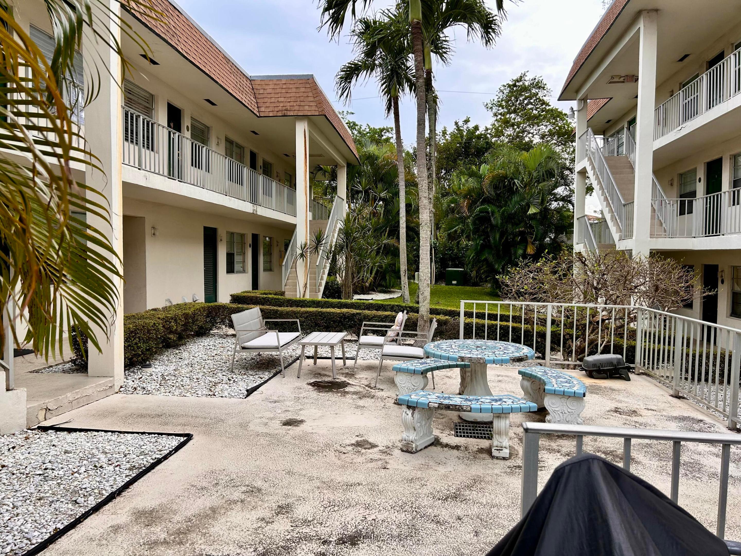 Great location! located in east Boca Raton close to FAU, I-95, restaurants and shopping. First floor condo with large walk in closet,, updated bathroom with walk in shower, track lighting in open kitchen and completely titled. Quaint complex with only two buildings, nice sitting area between buildings, bike storage and plenty of guest parking.
