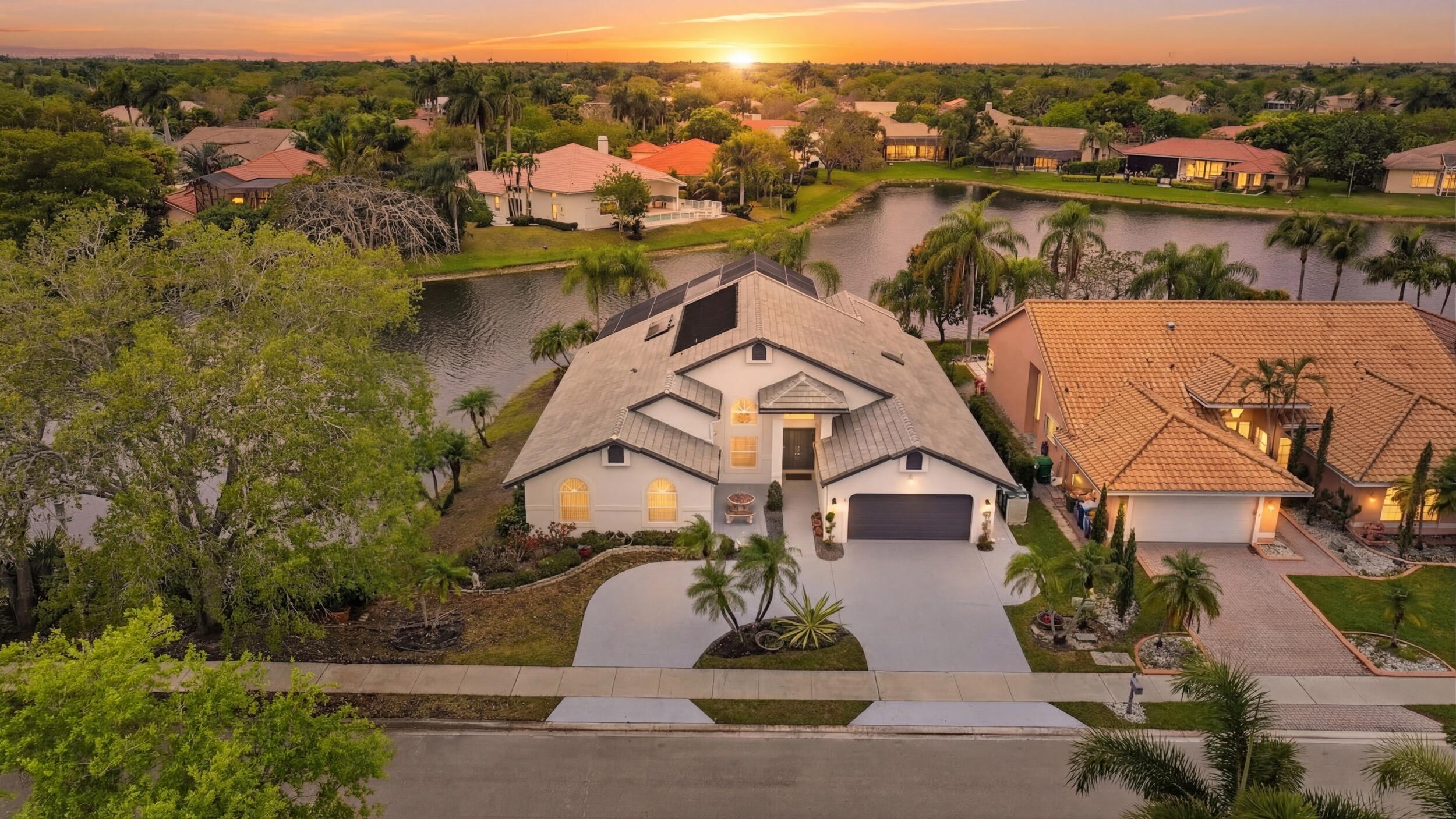 The best lot in all of North Springs and the only 6 bedroom in this school zone under $1,000,000! Featuring some of the best sunsets you'll ever experience. Vaulted ceilings create an expansive feel in this triple-split floor plan great for entertaining. Huge kitchen is open to the large family room w/ extended eat-in kitchen area. Separate formal living & formal dining rooms. Featuring a 2021 roof with Impact windows or shutters on all windows and doors. Primary bedroom overlooks the screened-in pool, has 2 walk-in closets, and access to the 6th bedroom which is perfect for a home-office/gym/nursery/sitting area. Primary bathroom features dual sinks, separate shower and tub. This is the forever home you'll want to raise your family in for the next 20 years.