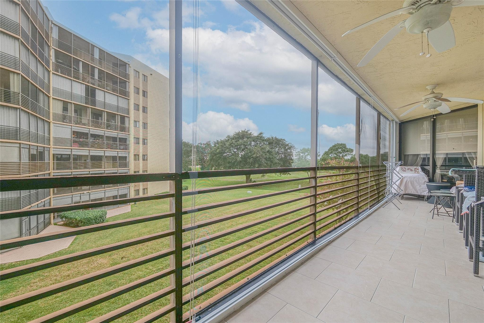 LOVELY REMODELED UNIT WITH PEACEFUL VIEWS ON THE OLD GOLF COURSE.   NICE TILES THRUOUT!  BATHROOMS AND KITCHEN REMODELED WITH GRANITE COUNTERS & STAINLESS STEEL APPLIANCES!  WASHER/DRYER IN UNIT!!  ALL ROOMS OPEN OUT ONTO THE TERRACE WITH SLIDING GLASS DOORS! WASHER/DRYER IN UNIT! BOTH BATHROOMS TASTEFULLY RENOVATED. CORNER UNIT WITH ACCORDION SHUTTERS TOO! EVEN SUN SCREENS THAT ROLL DOWN TO FILTER THE SUN!!  24 HR MANNED GATE! ASSOCIATION SAYS 55+, 700 CREDIT, $65,000 INCOME IN LAST 2 YEARS. INCLUDED IN MAINTENANCE: INTERNET, CABLE TV HBO, WATER, PEST CONTROL, INSURANCE, HEATED POOL, JACUZZI, TENNIS & PICKEL BALL, BBQ AREA, ACTIVITIES & MORE! A POSSIBILITY OF A GREG NORMAN GOLF COURSE!