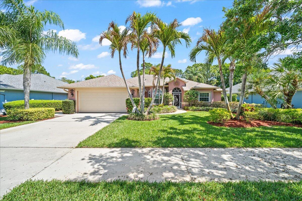 Welcome to this beautifully maintained home in the highly sought-after gated community of Sawgrass Lakes. Designed with a functional layout and defined living and dining spaces, this residence offers both comfort and privacy rarely found at this price point. The centrally located kitchen provides ample cabinetry and workspace ideal for everyday living and effortless entertaining, while natural light enhances the home's clean finishes and inviting feel. The sunken family room adds architectural character and creates a cozy distinct space perfect for relaxing or gathering. The spacious primary suite serves as a private retreat, with additional bedrooms ideal for family, guests, or a home office.  Step outside to a peaceful, exceptionally private backyard where mature, dense landscaping creates a serene setting for outdoor living. Thoughtfully equipped for both comfort and preparedness, the home features double-pane windows with accordion shutters, hurricane-rated entry doors in the garage and cabana bath, a 250-gallon propane tank with connections at the back patio for a grill and generator, and a portable propane generator included for added convenience and peace of mind.