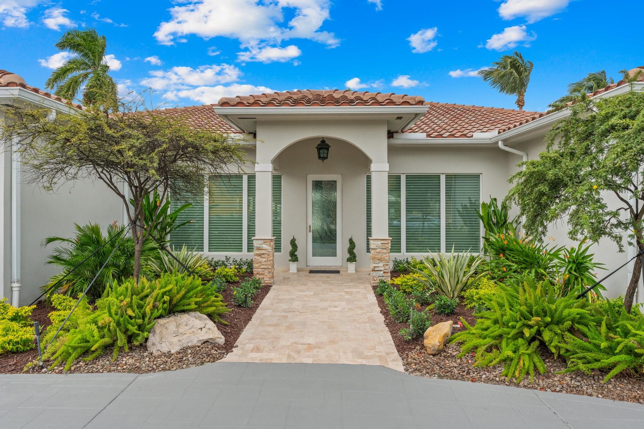 Motivated Seller! New Price Drop! Coral Ridge Waterfront With a Brand New 100’ Concrete Dock And 100 Amp Service! PLUS, A Spectacular House Renovation With A Full Rebuild For A Rare Chance To Live With The Tall Ceilings That You Love In This Elegant Residence. House Renovated in 2019 Including; Slab, Walls, Raised Roof Trusses, Electric, Plumbing, PVC Sewer Lines, Impact Windows And Doors. Custom Kitchen Cabinets With Granite And A Large Island, All New Baths, Impact Doors And Windows, Roof Tile, Flooring, Air Conditioning Including New Ductwork. 3 Bedroom 3 Bath Plus Cabana Bath With A Completely Open Floor Plan Laying Over A 120’ Deep Lot For An Expansive Backyard And Massive Lanai With A Full Bar!