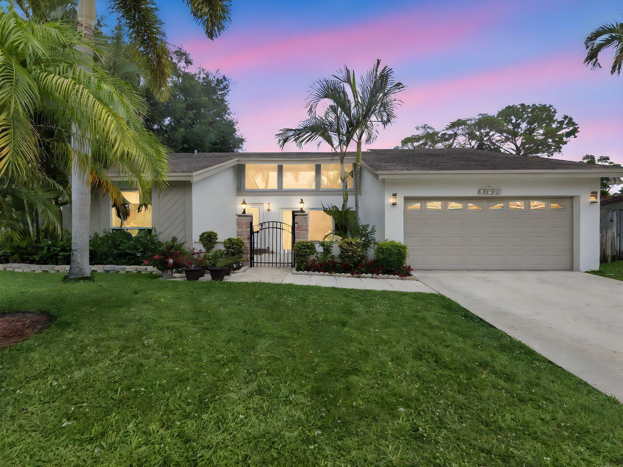 Oasis in the center of Boca. Recently updated home with a modern feel. Three bedrooms with a loft, two bathrooms and a half bathroom, open floor plan, vaulted ceilings, and tons of natural light. All tile and bamboo floors. Updated kitchen boasts European style cabinets, granite countertops, stainless steel appliances, and window for access dining area. Private backyard with Gazebo and screened pool. Amberwoods neighborhood is located within walking distance to A+ rated schools, YMCA and houses of worship. Enjoy your oasis home or drive minutes to dining, Town Center Mall, and entertainment galore.