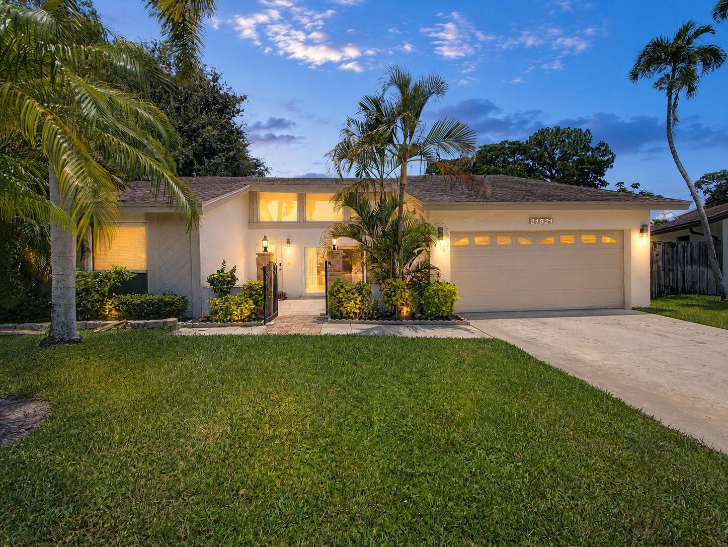 Oasis in the center of Boca. Recently updated home with a modern feel. Three bedrooms with a loft, two bathrooms and a half bathroom, open floor plan, vaulted ceilings, and tons of natural light. All tile and bamboo floors. Updated kitchen boasts European style cabinets, granite countertops, stainless steel appliances, and window for access dining area. Private backyard with Gazebo and screened pool. Amberwoods neighborhood is located within walking distance to A+ rated schools, YMCA and houses of worship. Enjoy your oasis home or drive minutes to dining, Town Center Mall, and entertainment galore.