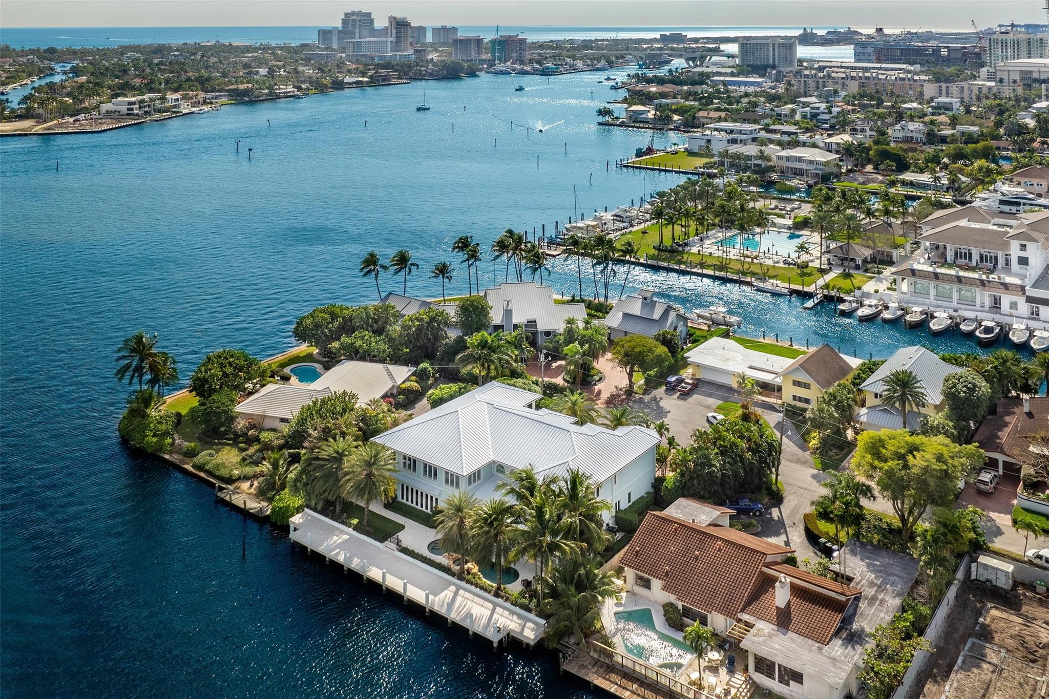 Embrace unparalleled sophistication in this meticulously crafted Rio Vista Isles waterfront estate, built to exacting standards. Featuring 7 beds, 6.5 baths and 120' of prime WF, it is only minutes away from the inlet, catering effortlessly to the avid boater. Its timeless Key West architecture harmonizes with lush landscaping for privacy, while offering stunning Intracoastal Waterway views. Inside, find stunning stained glass windows, an elevator, 700-bottle wine room, & 2 downstairs VIP suites. The upstairs oversized primary suite boasts a yoga room, private balcony, anddual spa-like bathrooms with connected shower. Outside, find a tropical pool with cascading waterfall & spa, a vast covered veranda, & 45 KW whole-home generator. No expense has been spared in this Rio Vista masterpiece!