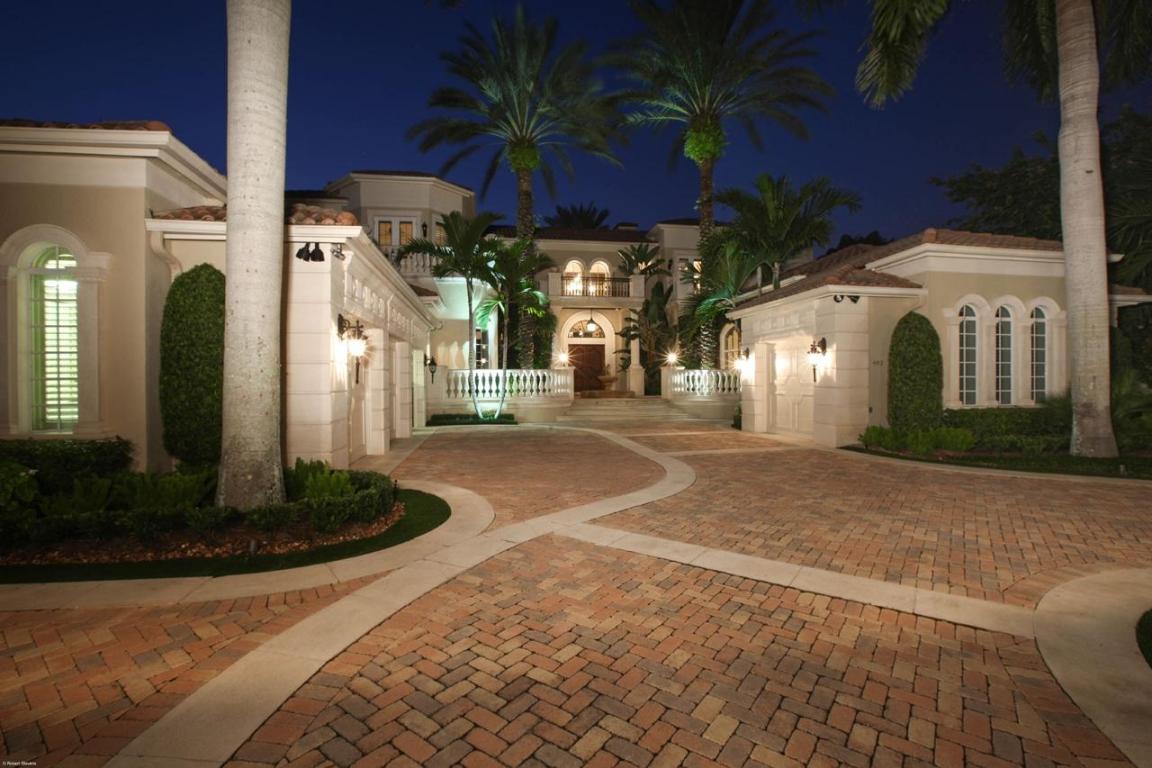 Grand Waterfront Estate - This home has it all...Over 150' of water frontage in prestigious Admirals Cove.  6 bedroom, 7.1 baths, 4 car garage, 3 laundry rooms are just the beginning.  Large kitchen open to family room renovated in 2012 with top of the line everything, updated electronics, re-surfaced pool, new flooring and much more.  500' guest suite with full bath, breakfast bar and one bedroom with awesome views of the pool and patio.  The master suite is like no other, his and her full baths with steam shower, large spa tub, exercise room and garage, large custom closets. This pataltial home will not last.