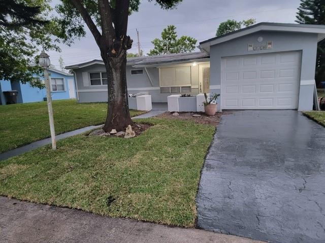 This property comes with 2 bedrooms, 2 bathrooms with long family rooms, and 1 car garage.  The property has central electricity with a generator which is centrally installed in case power is out.  The property has many updates including new tiles floor, updated bathrooms, kitchen, freshly painted inside and out, and many more.  Large front and back hard.  Large kitchen with space to eat-in kitchen.