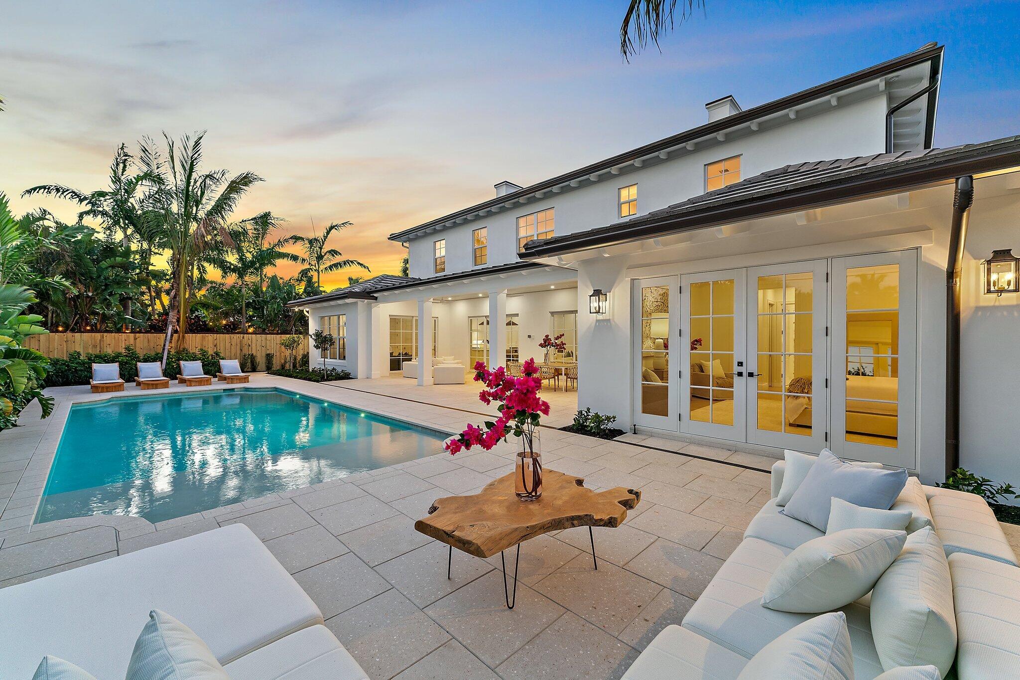 Easterly breezes await off of Lakeside Drive in this brand new construction estate, ''The Palm House'', curated by RJS Builders. Architecturally stunning and nestled amongst beautiful garden views with approximately 5,574 square feet of indoor/outdoor space, 4,046 square feet under air, for a total of 4 full bedrooms, plus den, loft, and 4.5 bathrooms. Beyond the coral stone foyer and private office, an expansive living room with fireplace and dining area seamlessly transition under voluminous ceilings, with wood beams above white oak floors, each with uniquely orchestrated garden and pool views. Stately Chef's kitchen, prep pantry with second refrigerator, dry bar with wine cooler and ice maker, and counter seating for gatherings, is anchored by white cabinetry and select stainless-steel and cabinet-front appliances finished in Carrara Gioia marble. Off the kitchen, an inviting den finished in shiplap and framed with picture windows leads to an adjacent cabana bath, exterior shower, and outdoor living beyond. Retreat to the expansive first floor Owner's suite with recessed tongue and groove wood-inlay ceiling, two walk-in closets with custom built-ins, and tranquil bath with dual sinks, soaking tub, and walk-in marble shower. Upstairs three spacious additional bedrooms feature en-suite baths, a secondary laundry, and are served by a multi-purpose loft. Endless outdoor entertainment awaits on the covered lanai with rich tongue-and-groove ceiling, summer kitchen, heated saltwater pool with sun shelf, all backlit with lush, tropical landscaping. Expansive artistic shell stone paver circular drive leads to garages for 3 cars with ceiling height for a single car lift. Reserved for the discerning resident, no detail or expense has been spared, including a 48-KW standby generator. Rare opportunity to immediately move in, just steps from Lakeside Park and an easy walk to the North Palm Beach Country Club!

Enjoy all that desirable, membership-optional North Palm Beach has to offer : new clubhouse, restaurants and bar, redesigned Jack Nicklaus Signature golf, driving range, tennis center, Olympic-sized swimming pool with splash play area, private boat ramp, marina, playgrounds, parks, organized activities, all minutes from the area's best education, dining, shopping, and Palm Beach International Airport!