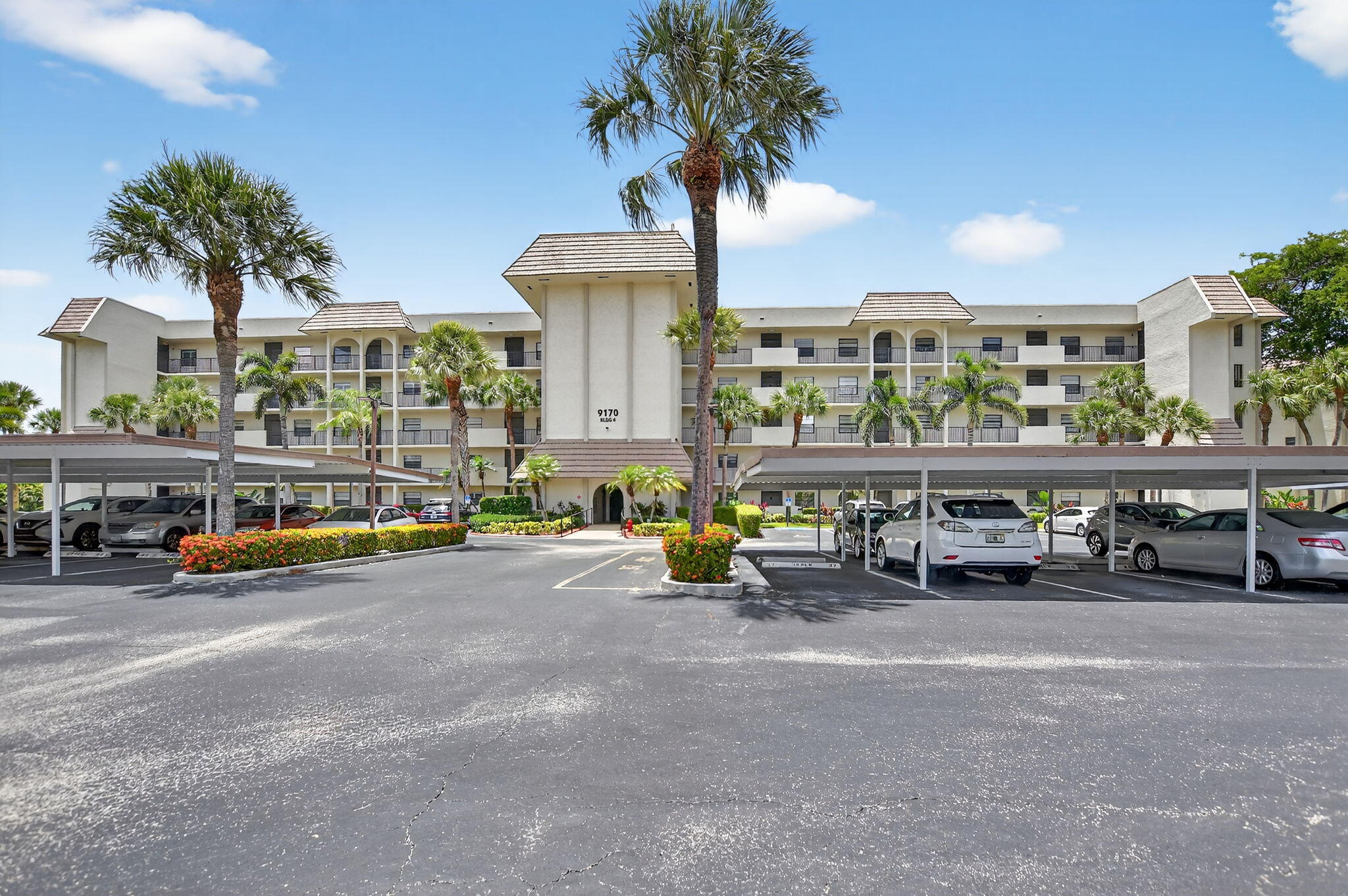 Enjoy easy first-floor access in this spacious 2BR/2BA condo featuring a large enclosed Florida room with expansive garden views. The updated kitchen offers granite countertops, white cabinetry, stainless steel appliances, and a convenient pass-through to the dining area. Bright, open floor plan with tile flooring in main areas and carpet/laminate in bedrooms. The generous primary suite includes excellent closet space and a bath with double sinks and a walk-in shower. The Patios offers 2 pools, spas, tennis, fitness room, game and billiard rooms. Community passed Milestone and SIRS studies with strong reserves and structural integrity. New hurricane-rated foam roofs add long-term value.