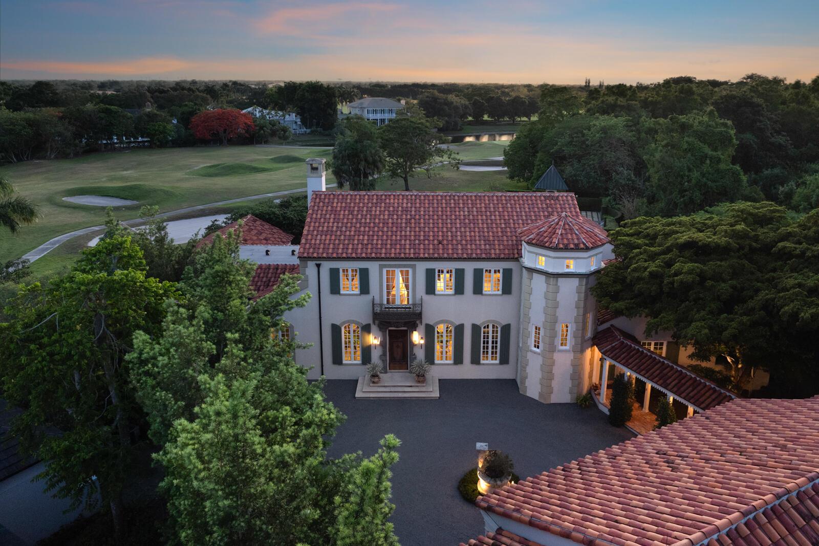 Within the highly coveted neighborhood of Bridle Path at the Polo Club, the property is set next to the 92-acre Cypress Preserve to the north and the golf course to the southwest, making it one of the best lots in Palm Beach Polo, with incredible views and privacy.  The main house has 5 bedrooms and 5 1⁄2 bathrooms, while the coach house has 2 bedrooms 2 bathrooms. As you drive through the coach house, you see the octagonal turret, with its award-winning design by the American Institute of Architects. Through the 17th-century door, you find a grand hall with vaulted ceilings and fixtures sourced from Paris. Down the hall is the great room, with vaulted ceilings and fireplace, which opens to a large formal dining area. Just past the great room is the primary wing with an office and pr ..  bedroom with its own private screened loggia. The kitchen, with a butler's kitchen, is well-designed for cooking and entertaining and is just down the hall from the family room. Then upstairs via the spiral staircase, there are 3 spacious bedrooms with ensuite bathrooms and a large sitting area. You can head outdoors from the screened loggia which can be accessed from many of the rooms on the main floor.  Outside the property features a topiary garden, a teak orchid house, a koi pond, a pool house with a half-bath and large private pool. Additionally, the property features a 3 car garage, a 2021 handmade barrel tile roof, a brand new whole home generator, impact windows and doors (minus the loggia doors), a resurfaced pool, and exterior paint.