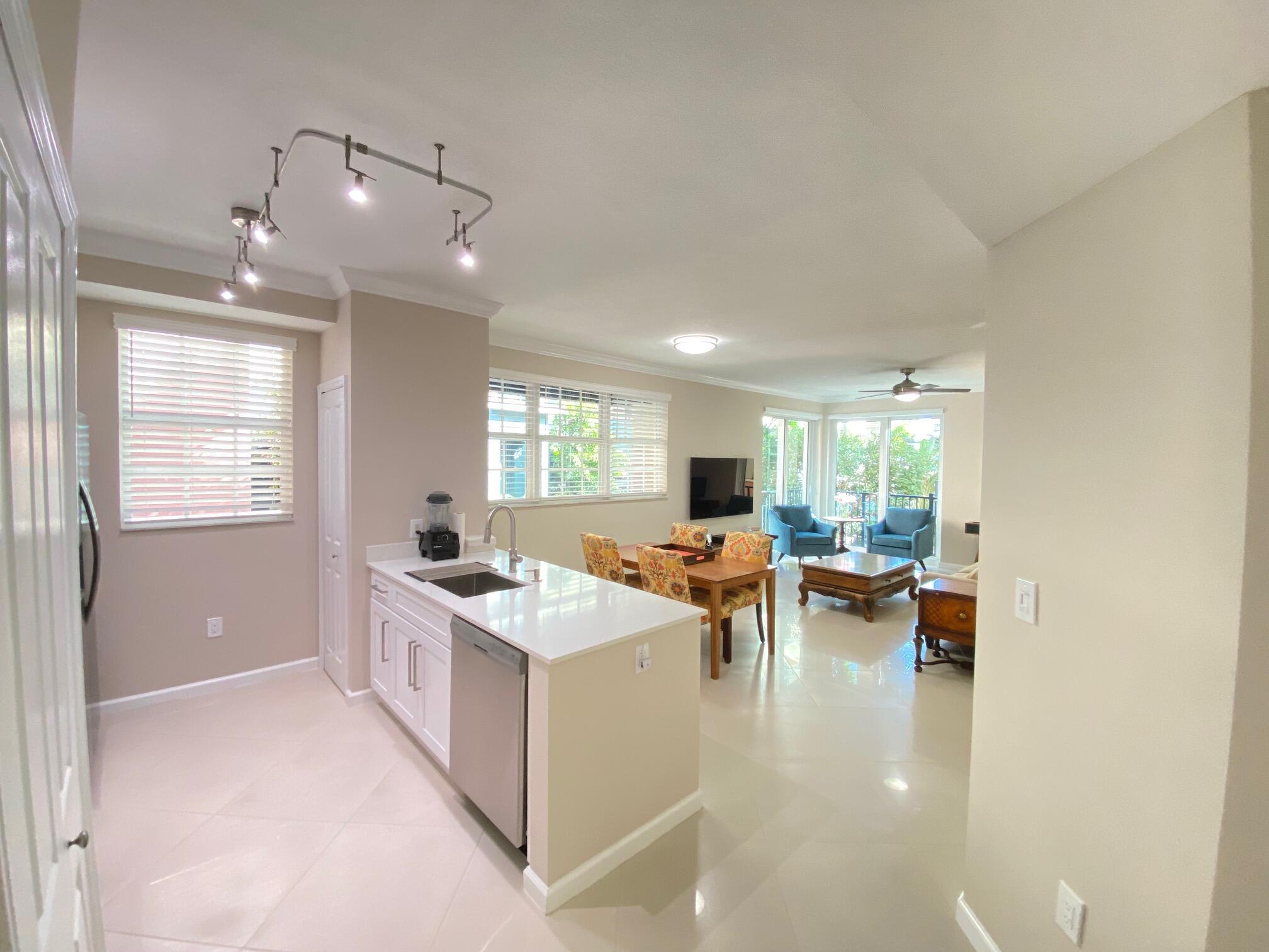 Great Location!! Beautiful spacious 1/1 renovated corner unit w/ high ceilings & lots of natural light! Stainless steel appliances & oversized washer/dryer. Custom blinds. Sitting area w custom swivel chairs. Floor to sealing sliders w electric zebra blinds. Reclining Custom Sofa. Luxury King bed, built in walk in closet, dual sinks bathroom & spa oversized soaking tub. Very Quiet! In the heart of downtown Delray Beach (Pineapple Grove). Walk to the beach, shopping, events, dining & entertainment. Bedroom overlooks a beautiful courtyard w tranquil fountain. Enjoy heated pool, BBQ & amazing sunsets on rooftop pool deck! Secure building & garage parking. Plenty of guest garage parking. No pets. Enjoy the comfort of home away from home in paradise!!